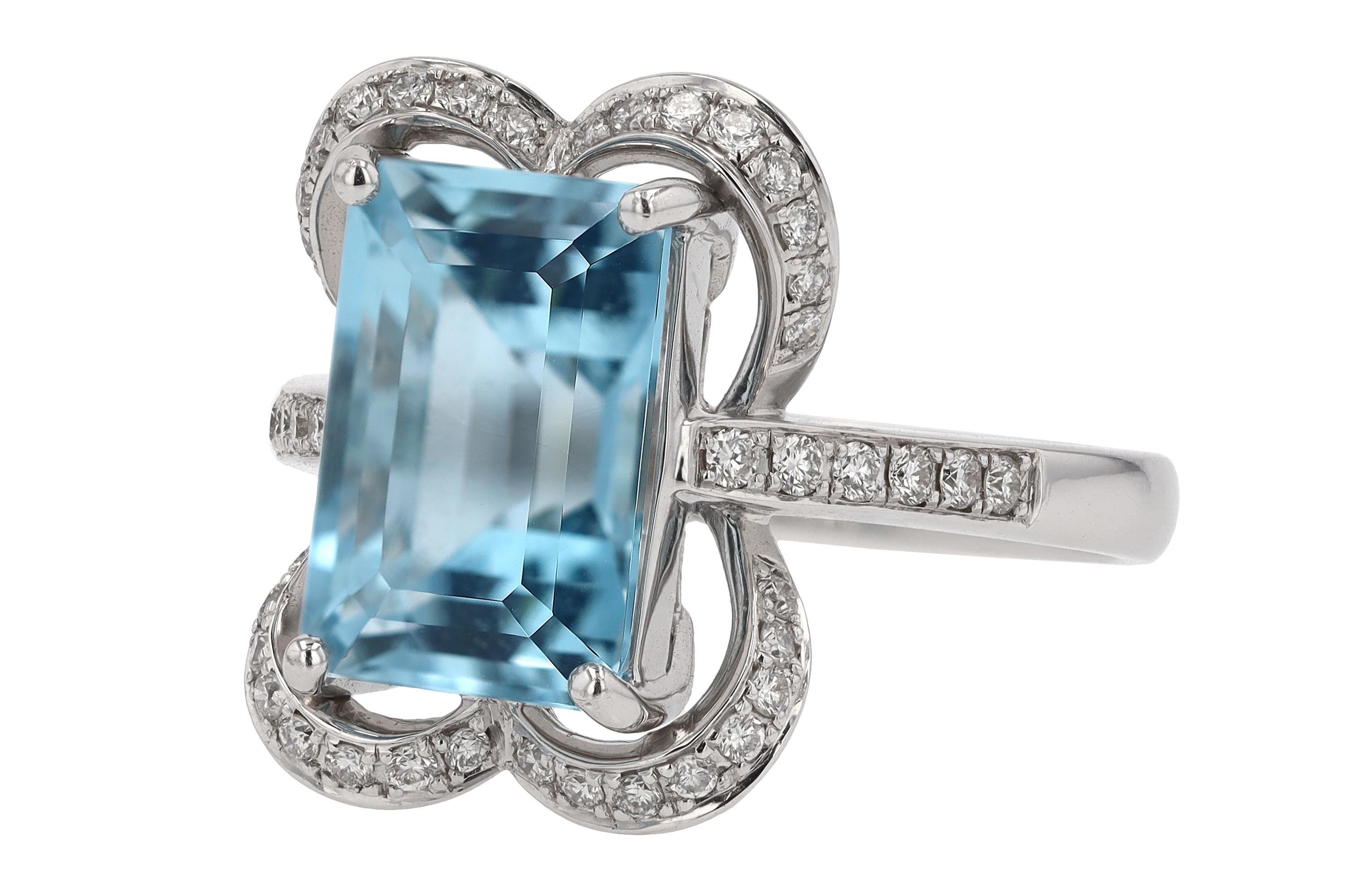 Contemporary Vintage Emerald Cut Aquamarine Alhambra Engagement Ring For Sale