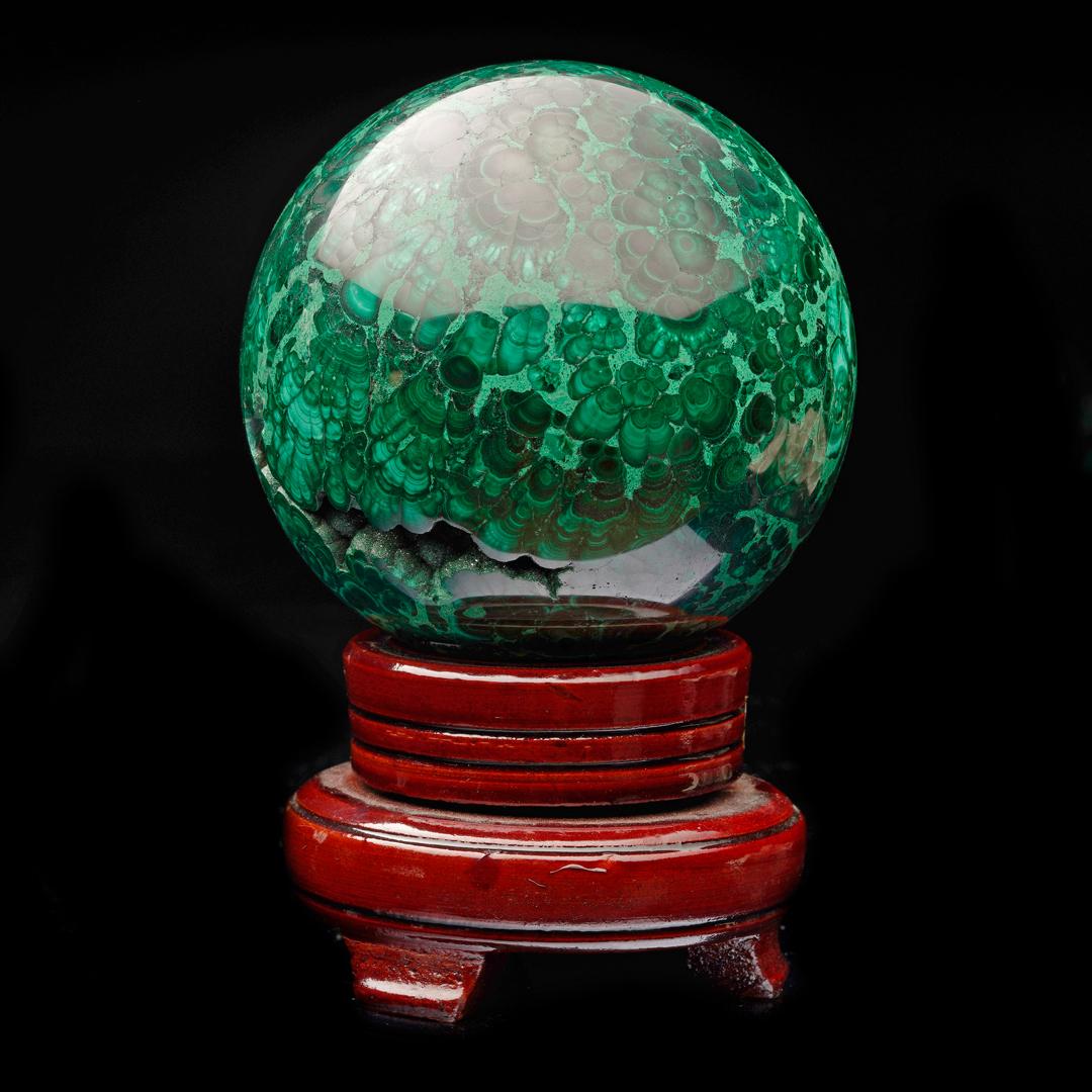 This substantially sized sphere of AAA-quality malachite with gorgeous color and natural patterns including a plethora of beautifully defined bullseyes comes from the DRC and has been expertly hand-polished to a gleaming luster to further enhance