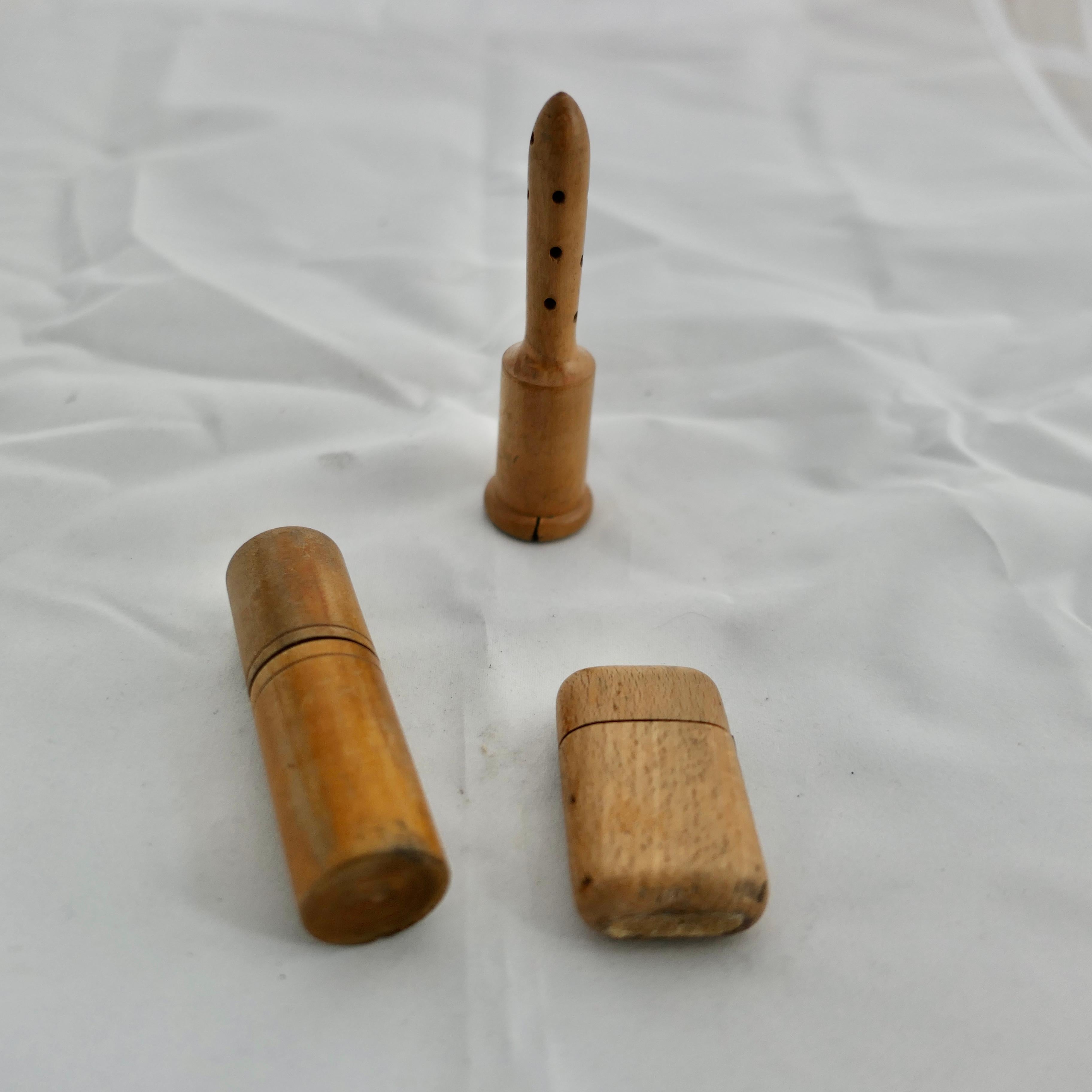 3 19th century Hand Made Treen Items, Powder, Perfume and Matches

A Glove powderer in sycamore, Glass perfume bottle in turned beech case and a beech vesta with brass hinge and matches
The glove powderer is  is 4” in diameter and 2” high
SC87