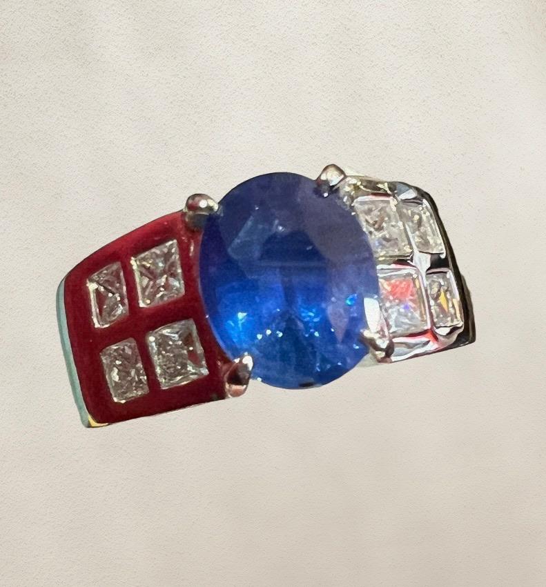 Contemporary 3, 23 Carat Blue Sapphire, 0, 95 Carat Cut Princess Engagement Ring For Sale