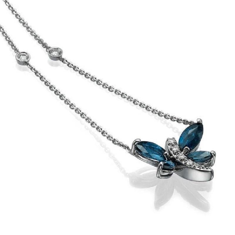 A handmade Sapphire and Diamonds Dragonfly pendant made of 14K White Gold set with a marquise cut Sapphire of 0.70 carat accented by natural round diamonds.
 The center stone of this beautiful pendant necklace is of excellent cut, and Blue color.