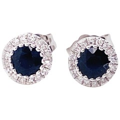 3/4 Carat Round Blue Sapphire and Diamond Halo Stud Earrings in 14 Karat Gold