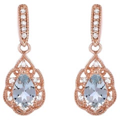 3/4 ct. Boucles d'oreilles en or rose 14 carats ornées d'aigue-marine et de diamants ronds de qualité A