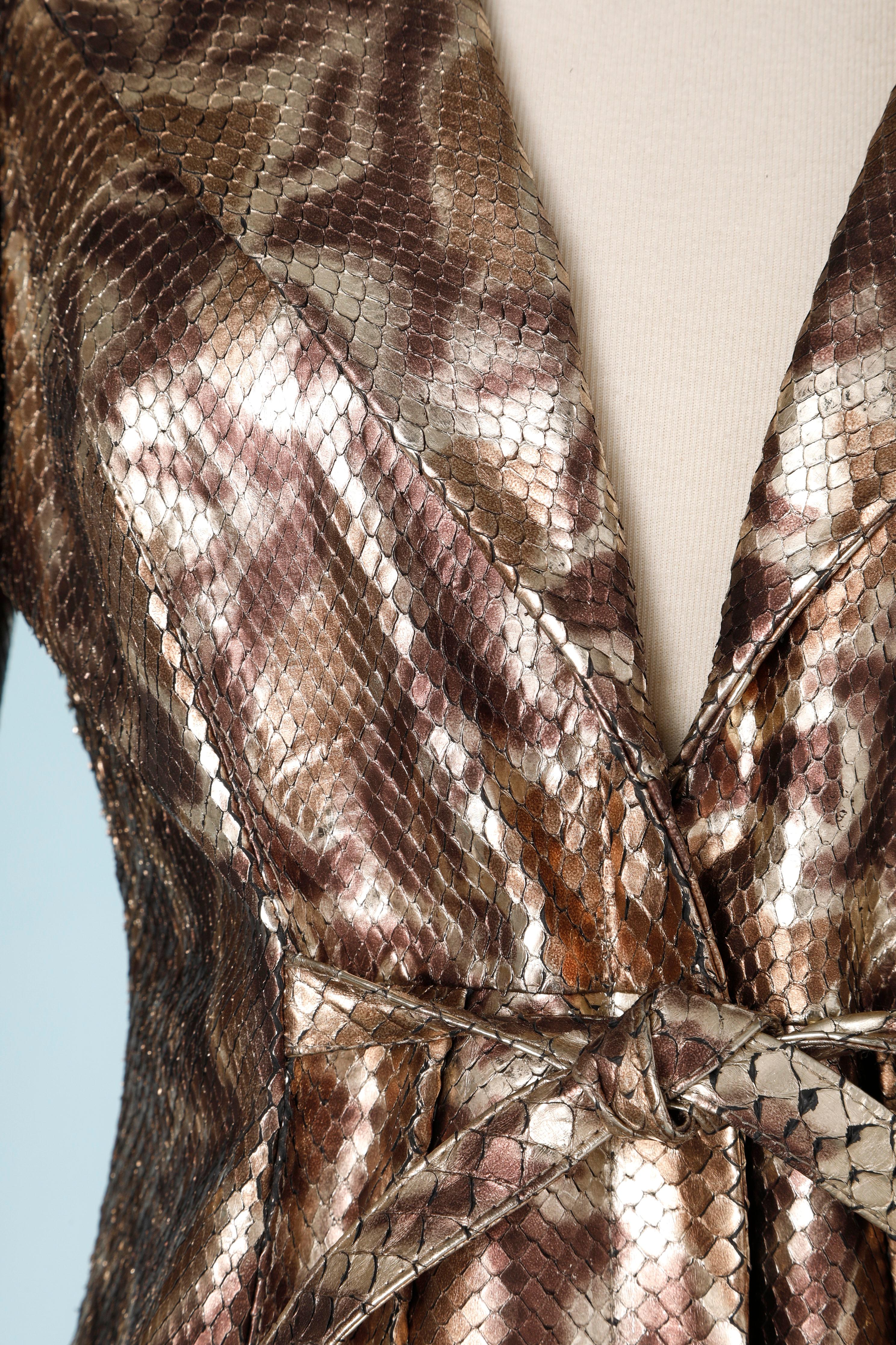 3/4 jacket in animal print python in shades of brown belt Shiro
back width 40cm
Size 36 French 
40 IT
All real leather 
specialist leather cleaning only 
This garment is made from top quality skins. Every single skin has been hand treated. According