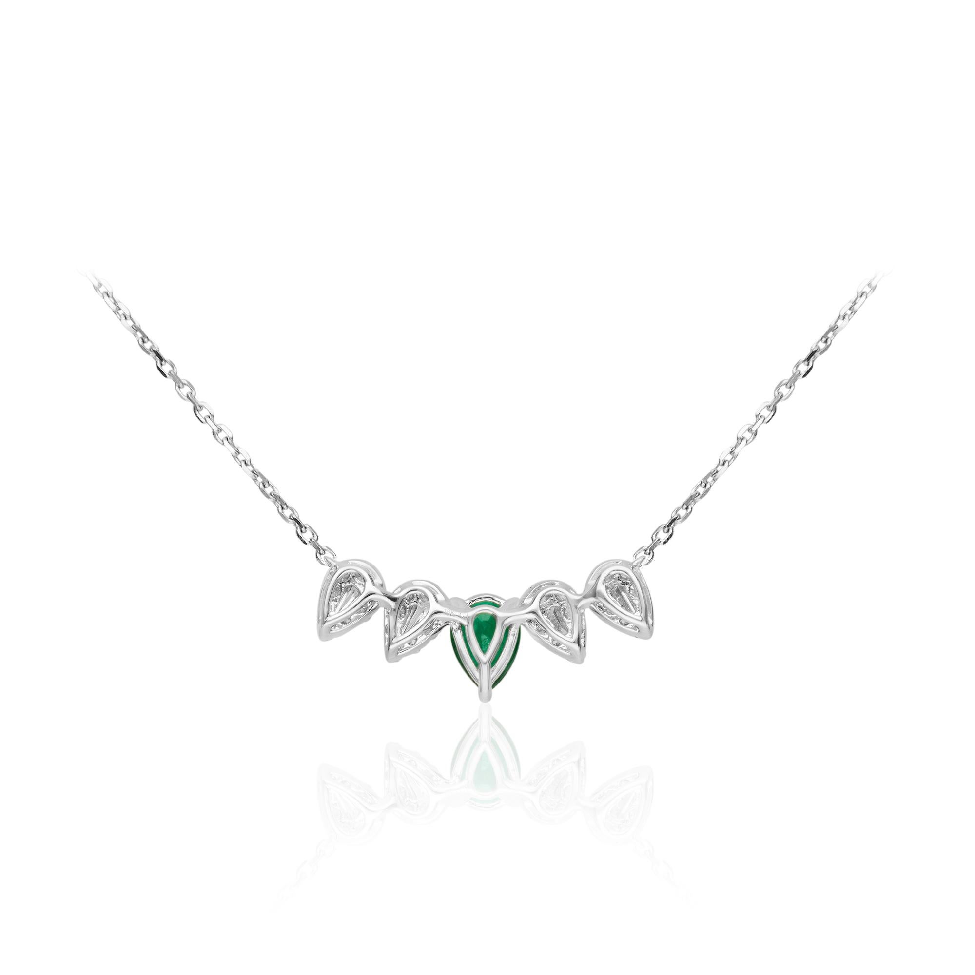 This one of a kind Necklace is crafted in 18-karat White Gold and features a 1 Emerald 3/5 Carat, 4 Baguette Diamond 1/11 Carat & 32 Round Diamond 1/3 Carat and this Necklace is a perfect gift either for yourself or someone you love.