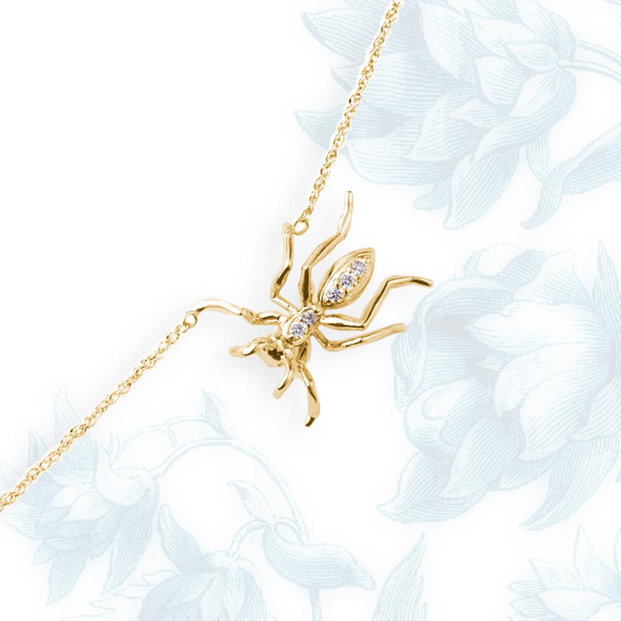 This exquisite limited edition lariat necklace is the perfect accessory for the woman who wants to make a statement with her jewelry. The ant-inspired design is crafted with the utmost attention to detail and adorned with 15 brilliant-cut round