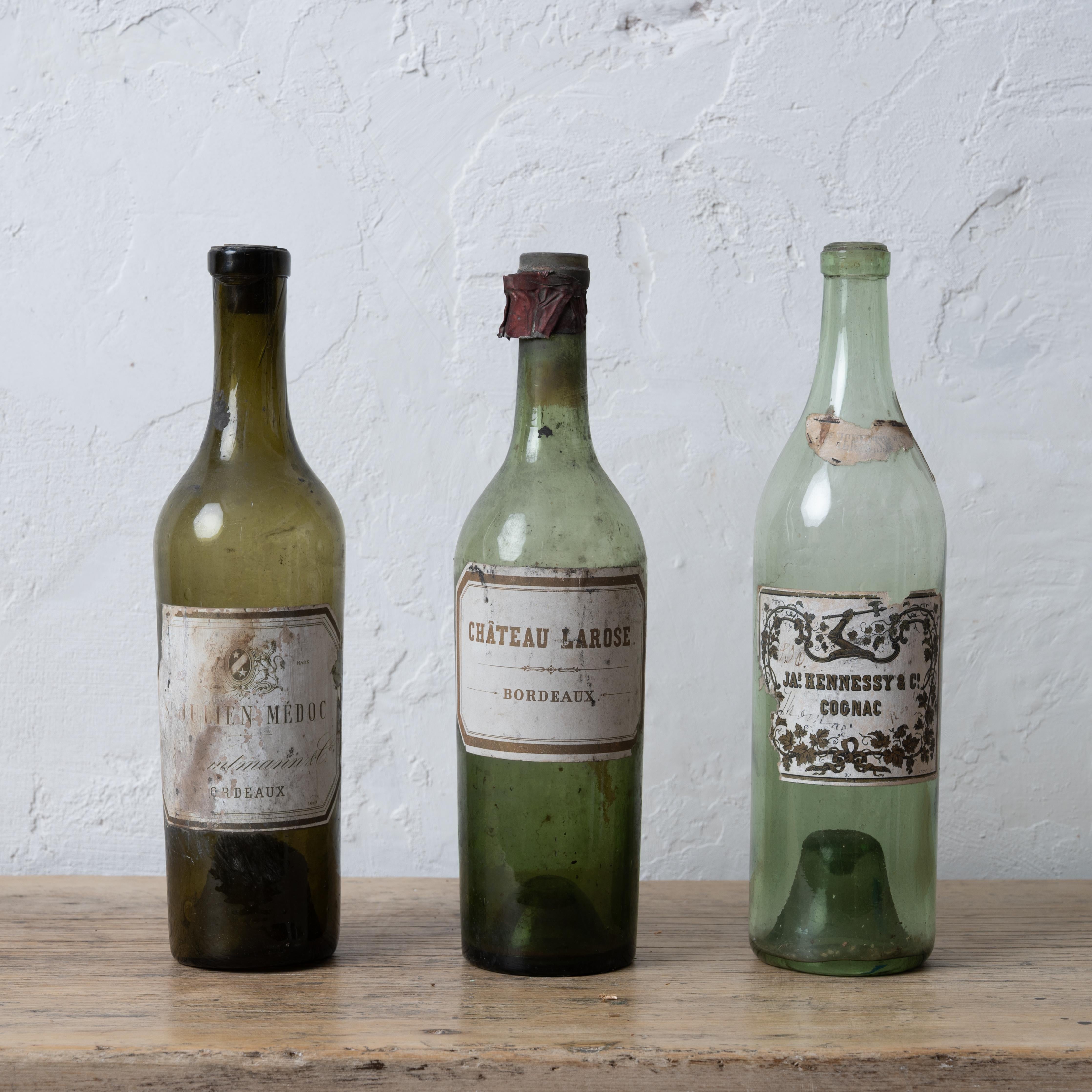 St. Julien Medoc, Chateau Larose and Hennessey Cognac bottles, early 20th century.

Deaccessioned from the historic Owen-Thomas House cellar, Telfair Museums.

3 inches wide by 11 ¾ inches tall 





