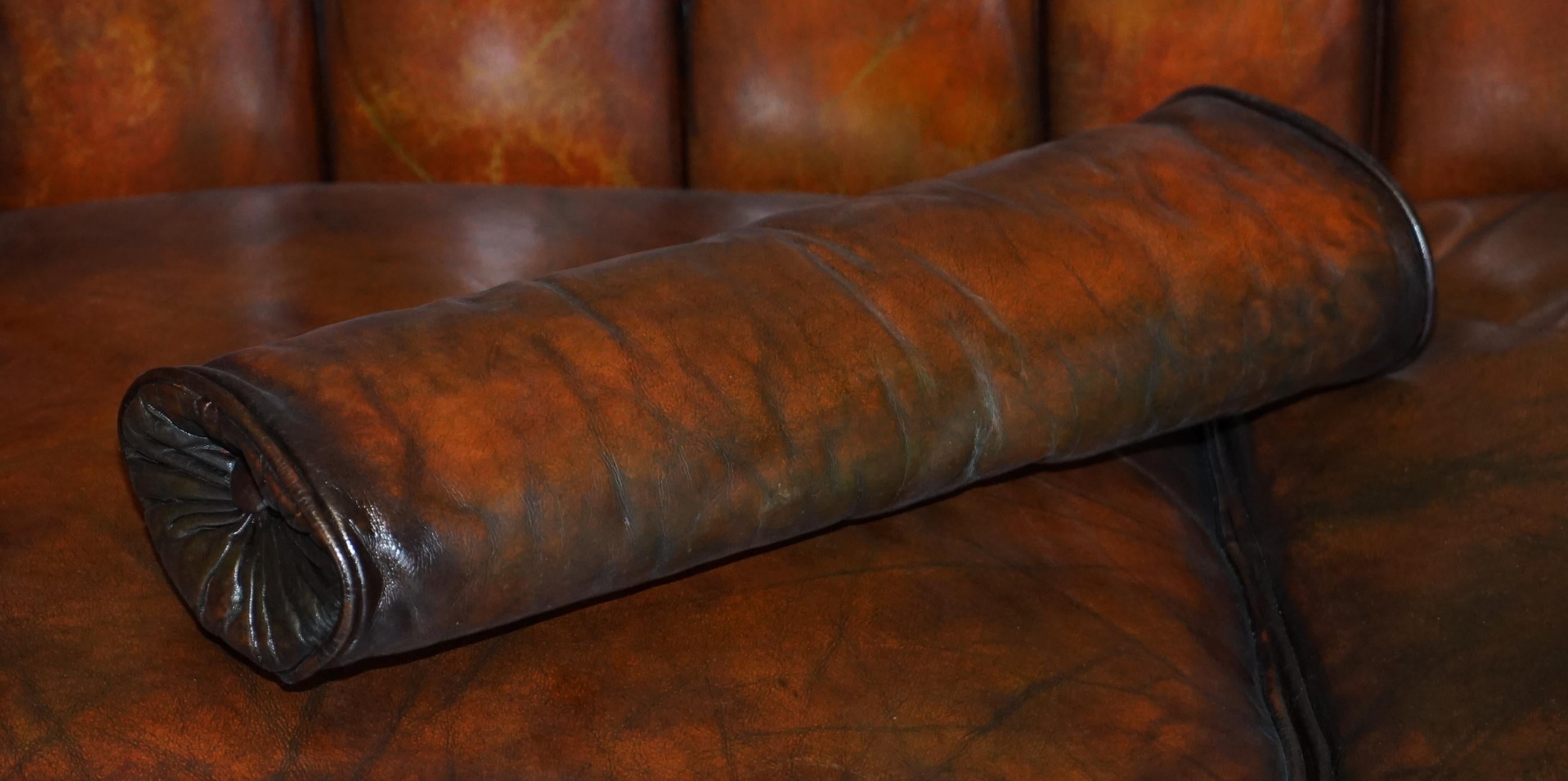 We are delighted to offer this lovely set of three restored circa 1900 hand dyed brown leather bulster cushions with feather filling

These are lovely decorative pillows, used for lumbar lower back and for the sides of sofas to sit next to the