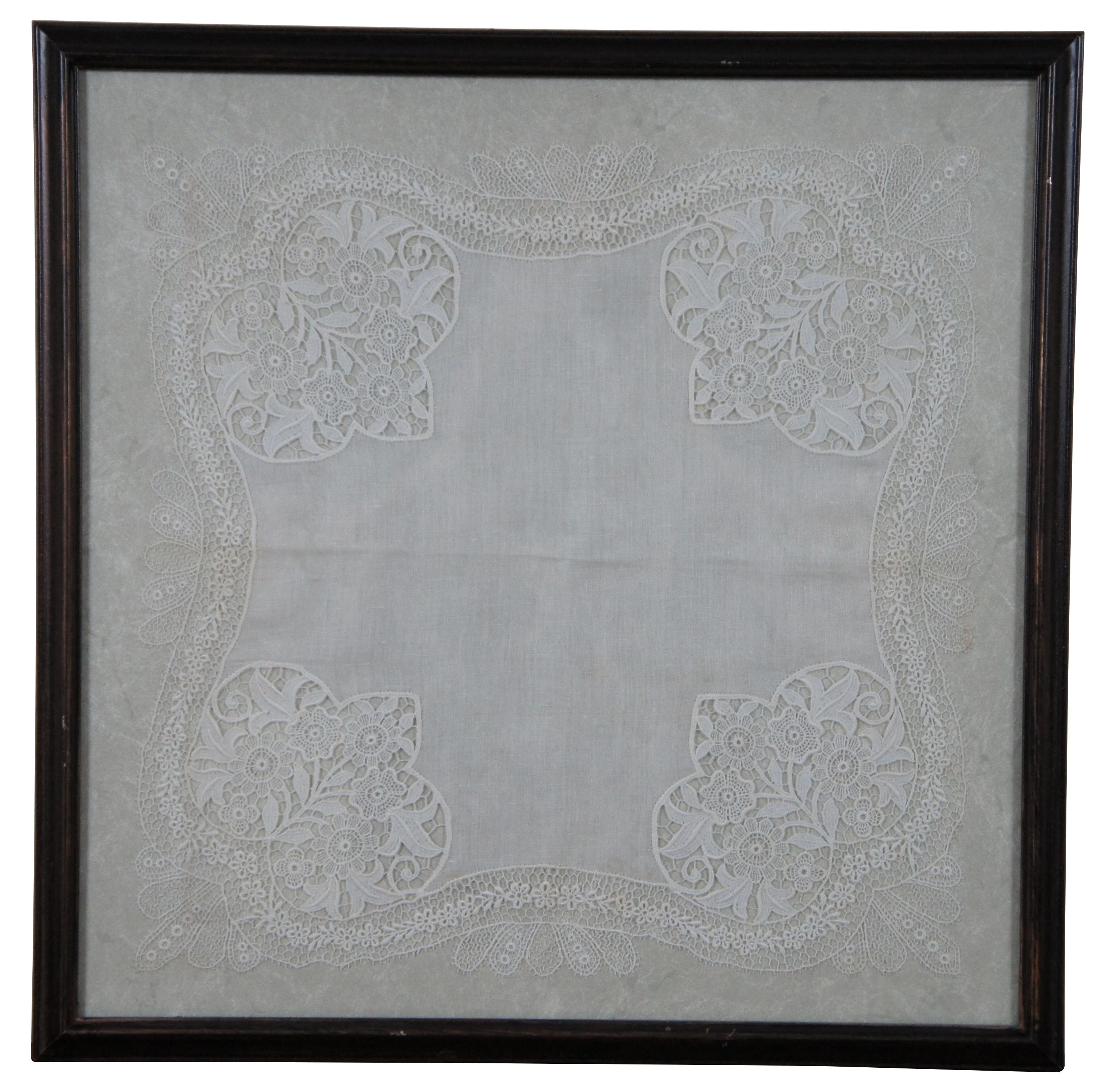 Set of three framed floral intricately embroidered and lace handkerchiefs.

Measures: 14” x 0.75” x 14” / Sans Frame - 11” x 11” (Width x Depth x Height).
