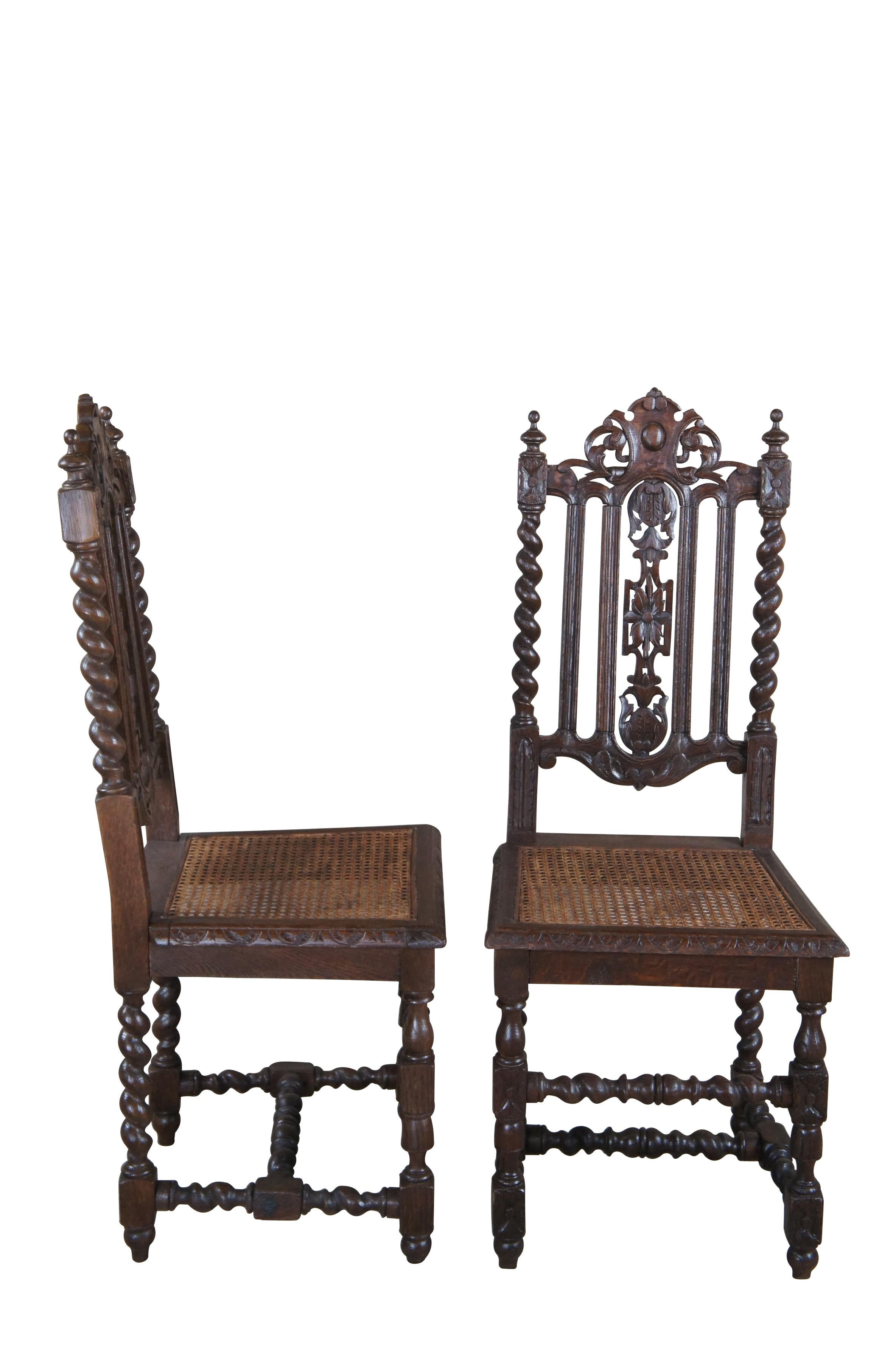 Set of 3 Antique French Renaissance dining chairs.  Beautifully crafted with oak frames carved in a Baroque manner with pierced backs and barley twist supports.  Features woven cane seats neatly framed by a beveled and carved wooden seat frame. 