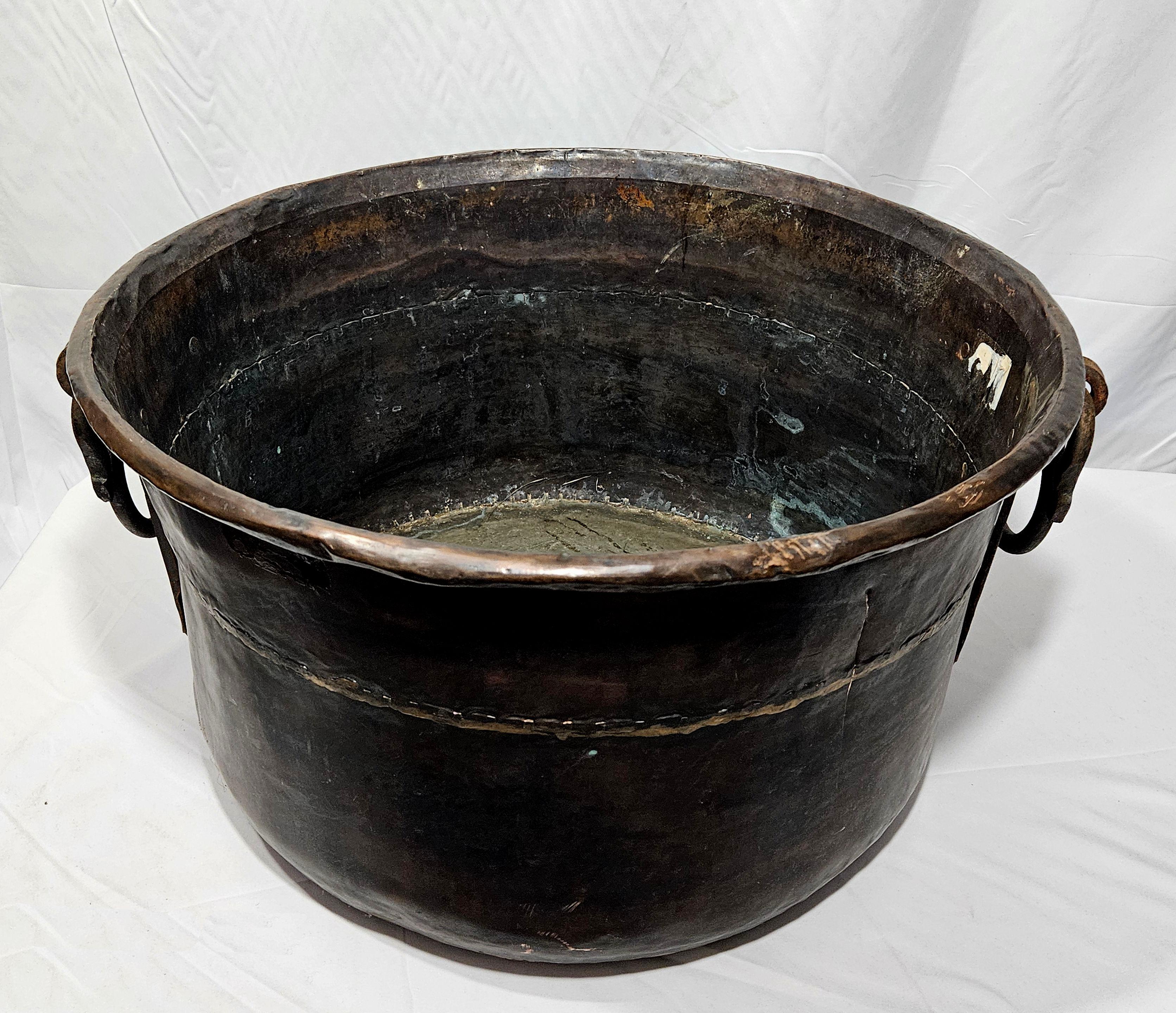 3 Antique Heavy and Thick Solid Copper Buckets with wrought iron handles
1. from the top left: Height: 11 in (27.94 cm)Diameter: 16 in (40.64 cm)
2, from the top right: Height: 10 in (25.4 cm)Width: 20 in (50.8 cm)
3. from the bottom: Height: 13 in