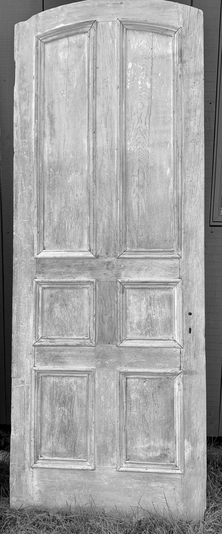 Three very large monumental over size rustic antique architectural paneled doors with oval top that will add character and style to any house. The doors are suitable for many decor including country classic, Swedish Gustavian or French