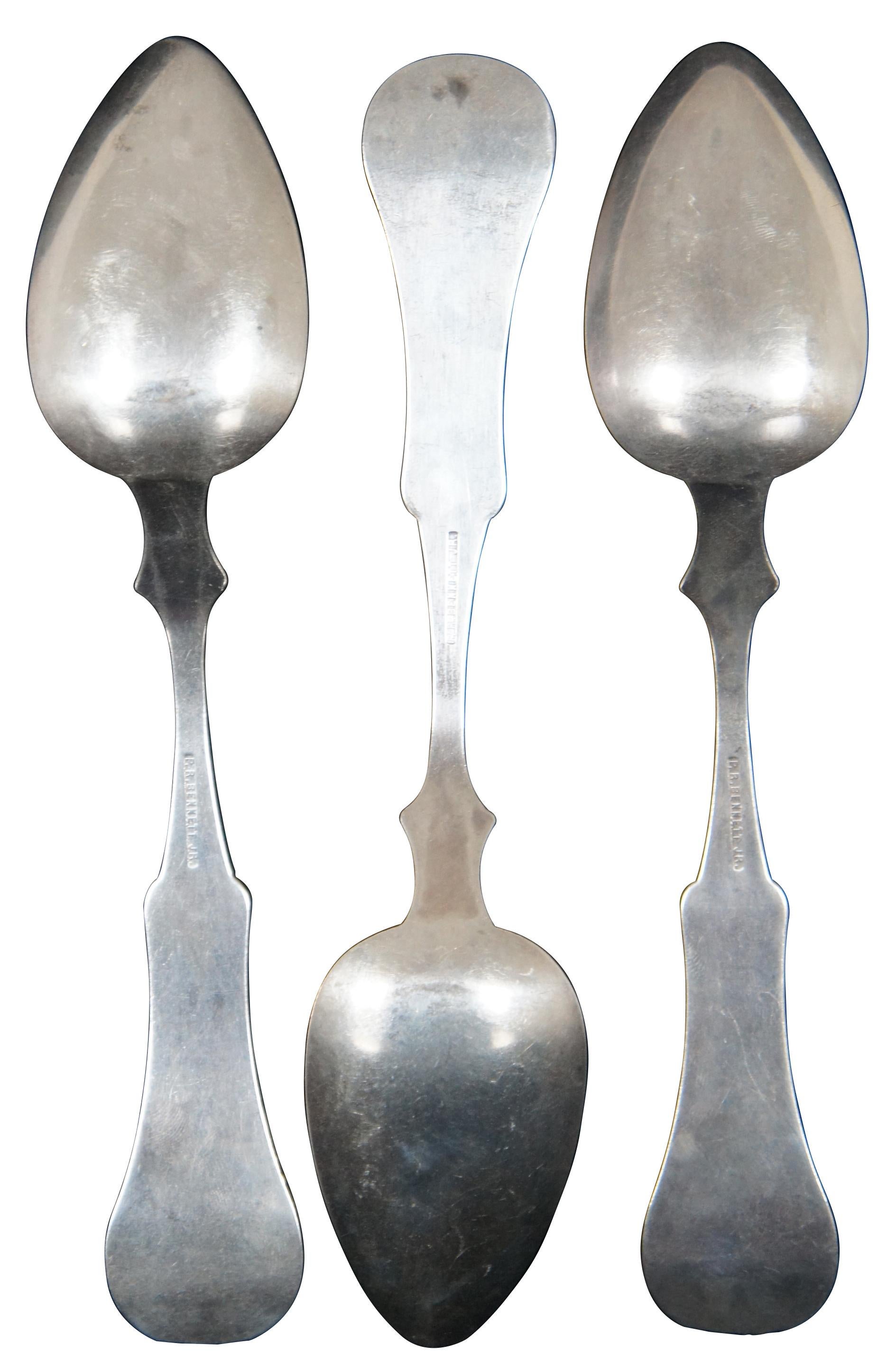 Set of three antique coin silver table spoons crafted by P.R. Bennett Jr, a mid 1800’s Ohio jeweler, monogrammed E.C.

Measures: 7.125” x 1.5” / 30.2 g (Length x width / weight).
  