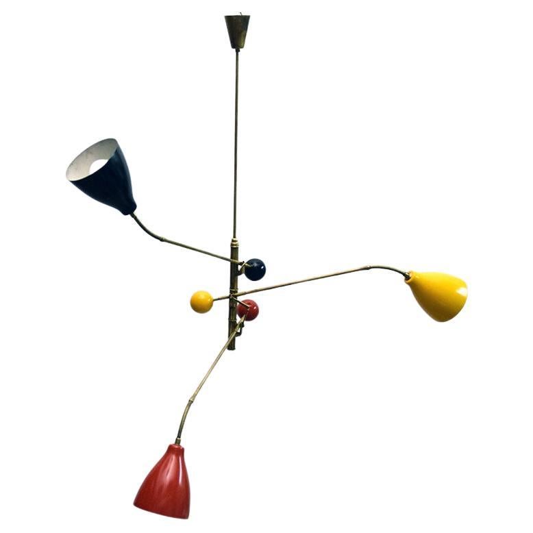 Very rare three-arm chandelier designed by Angelo Lelli for Arredoluce, 1950s.
Structure in brass and lampshades in painted aluminum.
The arms rotate 360 degrees and are adjustable in inclination.
Adjustable lampshades by means of the flexible