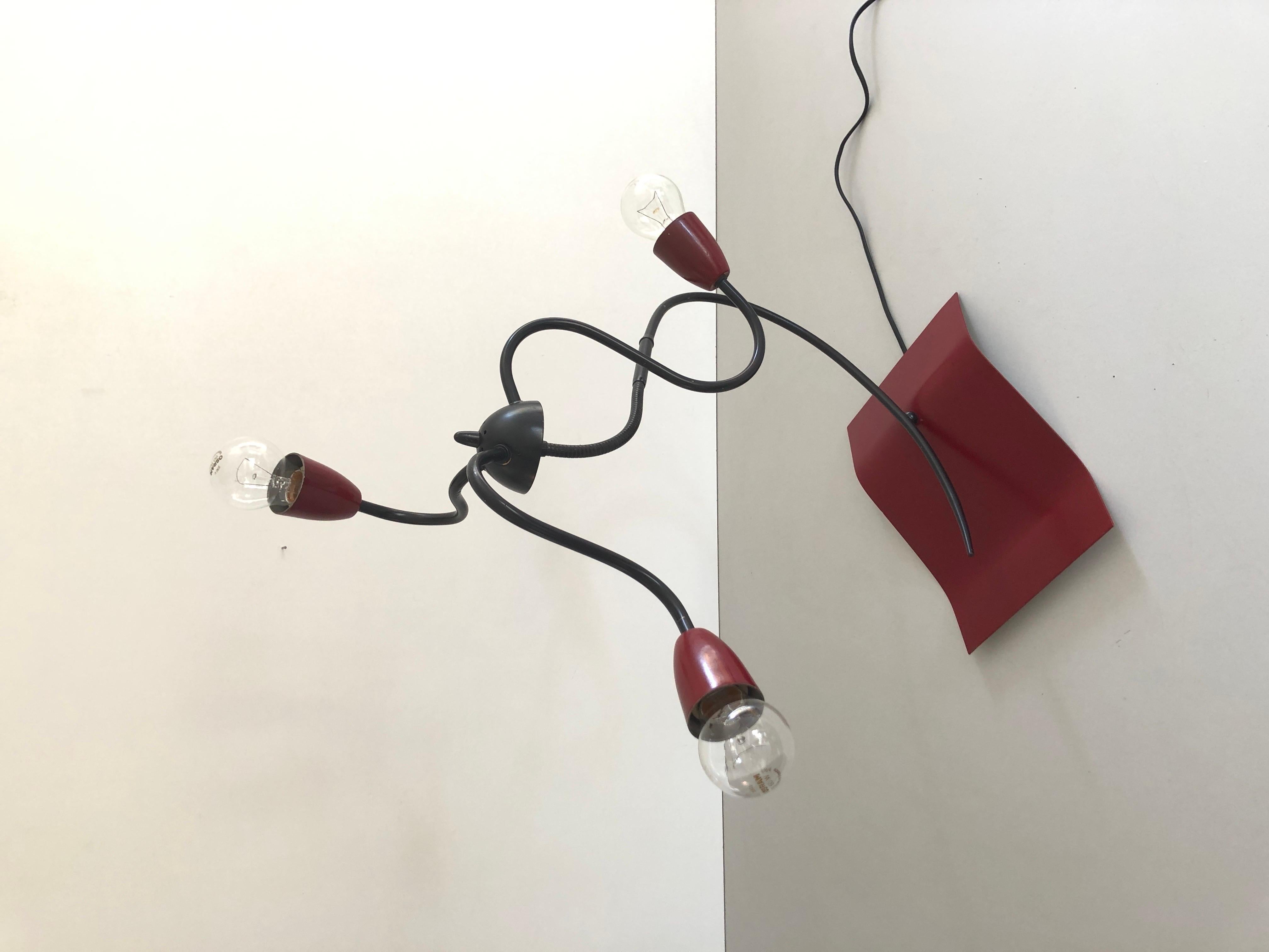 3-armed Adjustable Bordeaux Metal Rare Atomic Table Lamp, 1960s, France

Lamp is in very good vintage condition.

It has European plug. It can be converted to other countries plugs with using converter. Also it can be rewired different type of plugs