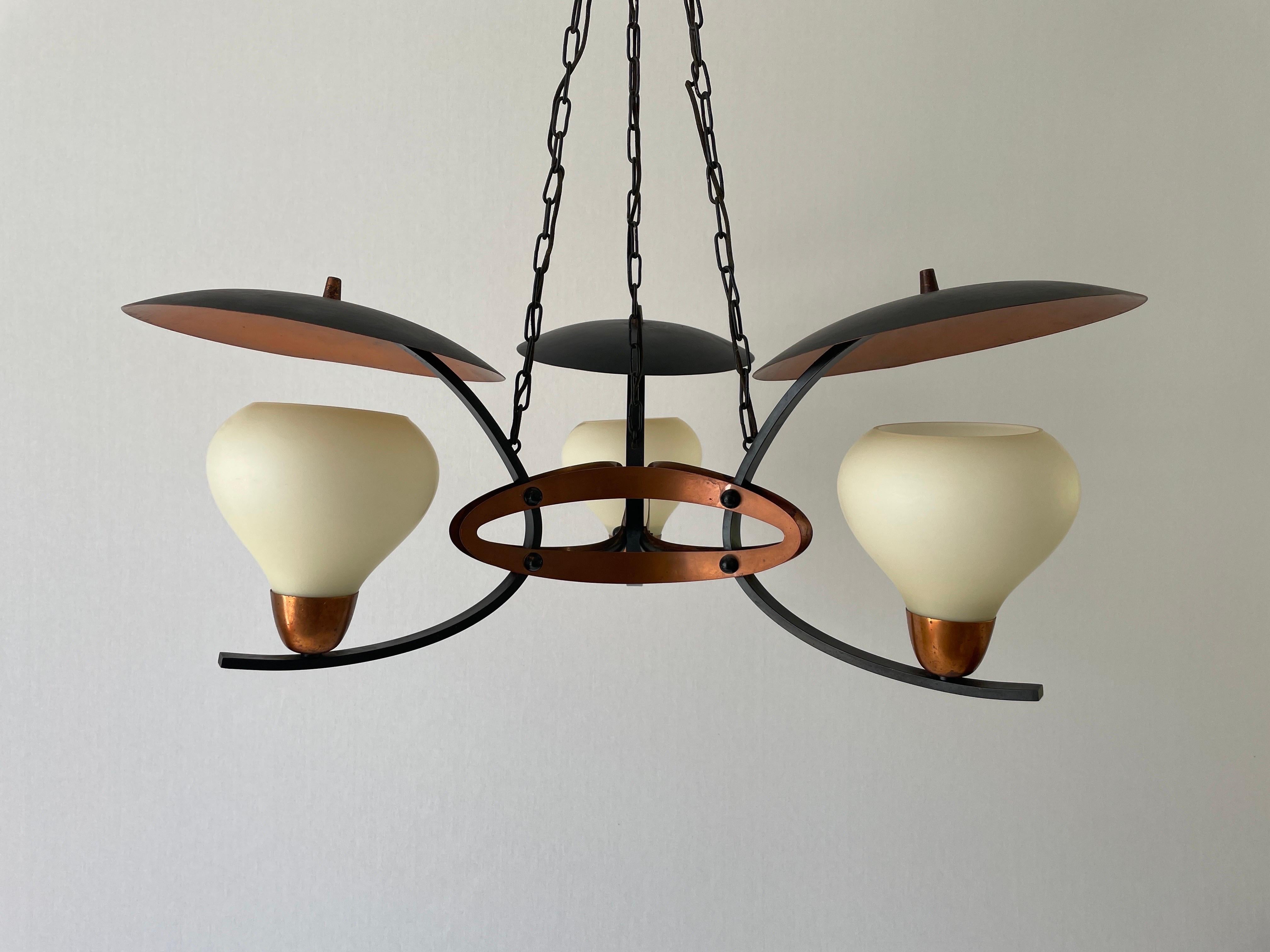 3-armed Glass and Copper Black Metal Chandelier, 1960s, Germany

2 pieces available 


This lamp works with 3 x E14 light bulbs.

Measures: 
Height: 74 cm
Overall shade diameter and height: 70 cm and 32 cm