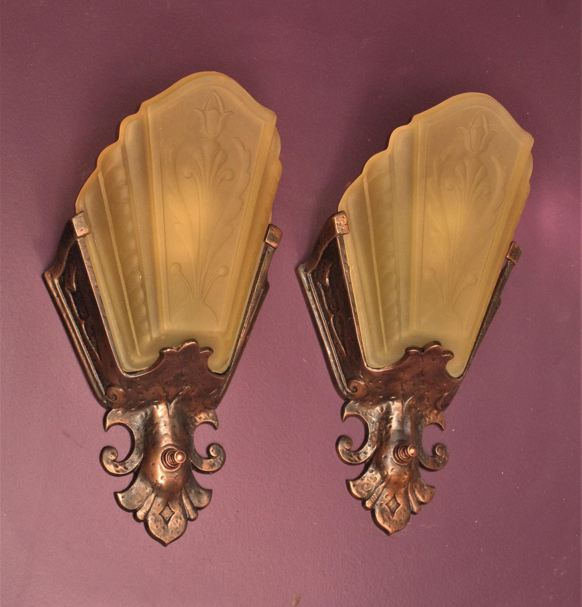 Priced per pair with three available (1 & 1/2 pair).  Single at 1/2 pair price.
A great pair of vintage wall sconces from the early 30s. What makes these antique sconces so unique is the design elementation. Although they have some art deco