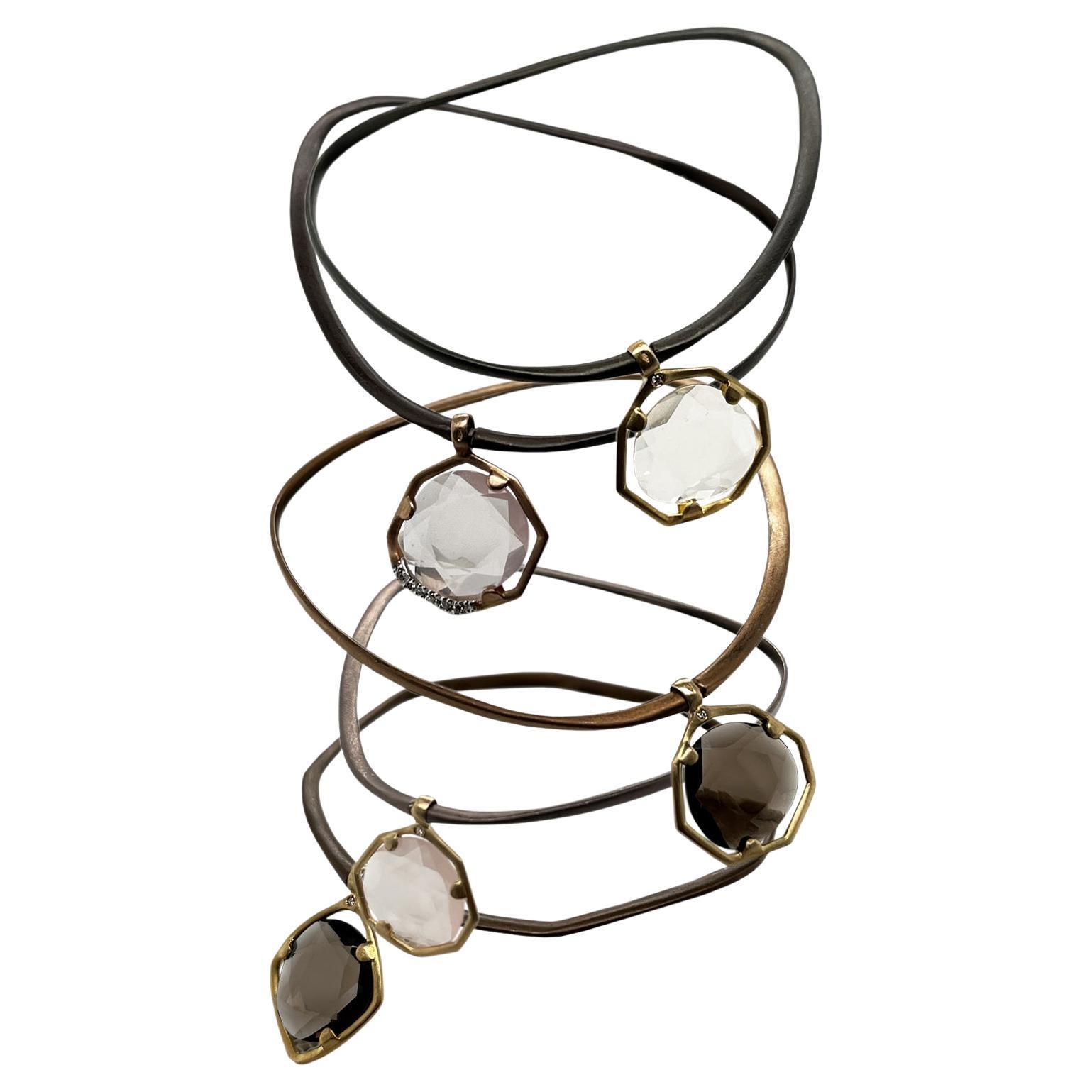 3 Bangles in silver and gold with smoky quartz, rock crystal &  pink quartz For Sale