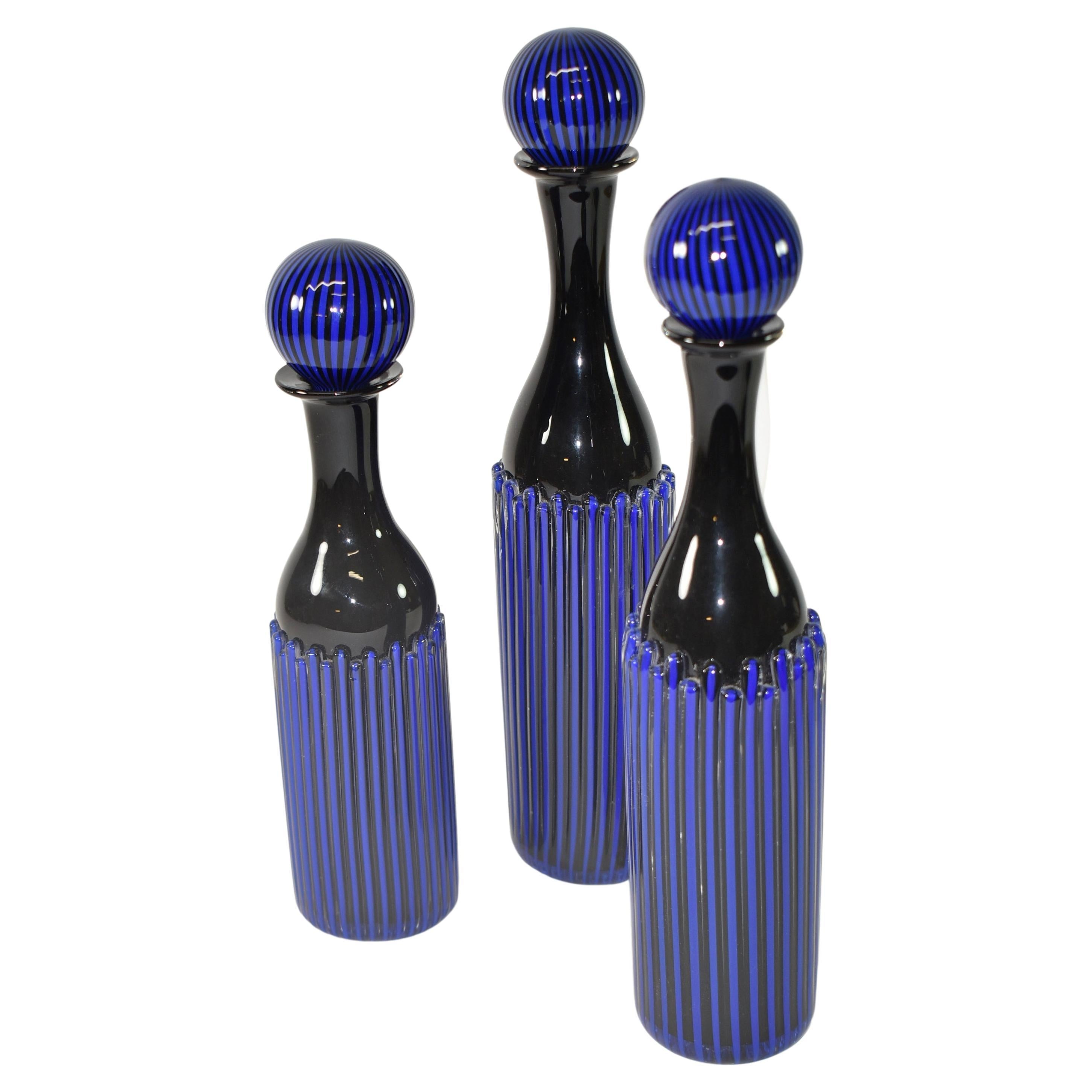 3 Blue Hand Blown Glass Bottles by Peter Greenwood For Sale