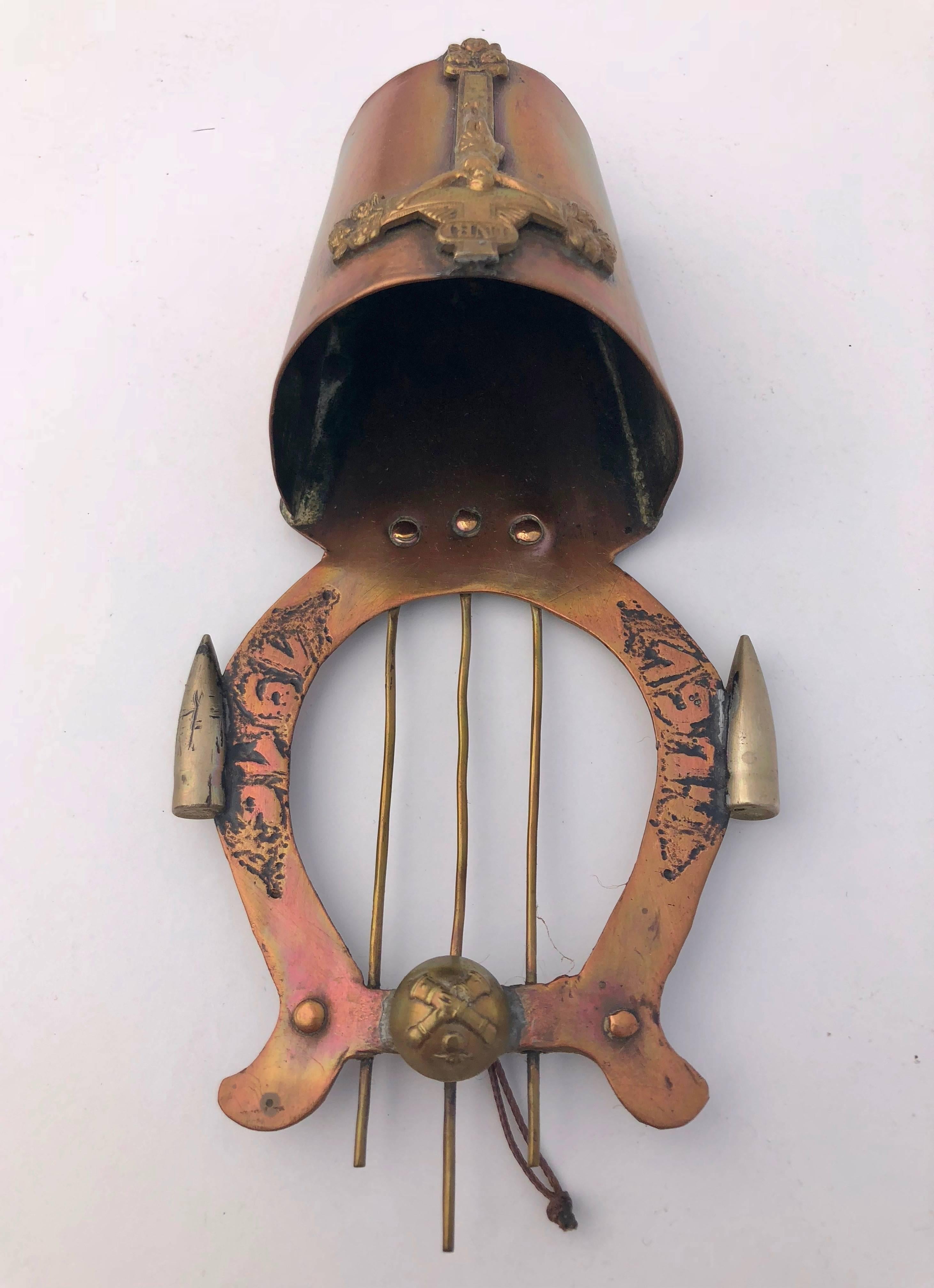 These handmade brass and copper Trench art holy water bénitiers with crosses or a crucifix are a truly unique and moving collection. Trench art is a decorative item made by soldiers or prisoners of war offering insight not only to their feelings and