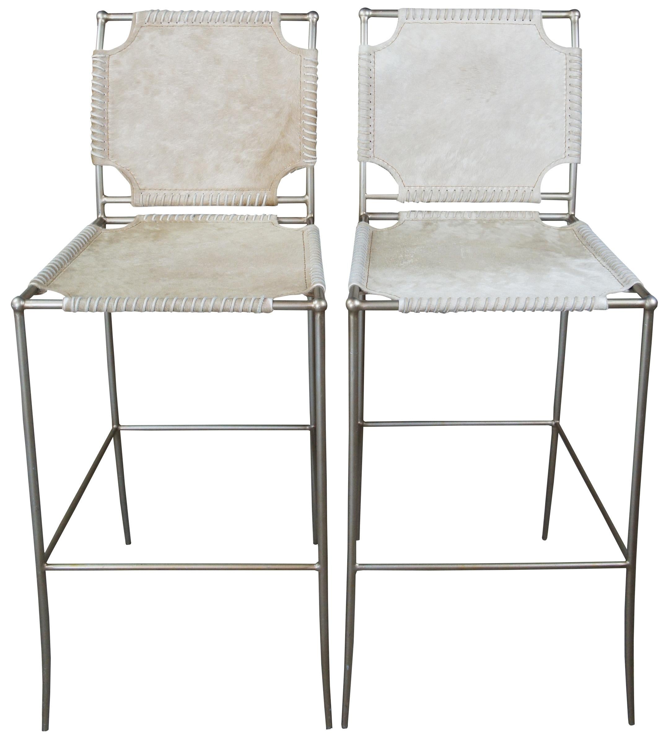 3 Caracole in stitches bar stools, ATS-BARSTL-001. Part of their modern artisan line. Features a streamline metal frame with leather wrapped seat and back.
  