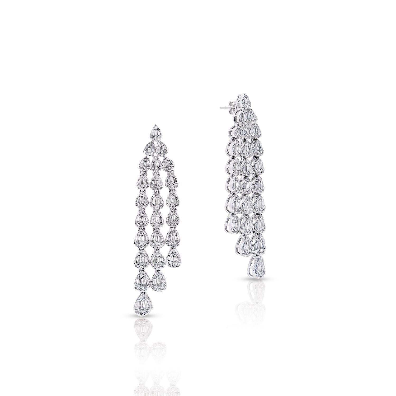 Crafted from premium-quality 14-karat white gold and featuring a stunning carat weight of 3.21 carats, these earrings are sure to turn heads wherever you go. Perfect for any occasion, these stunning earrings are sure to be a treasured addition to
