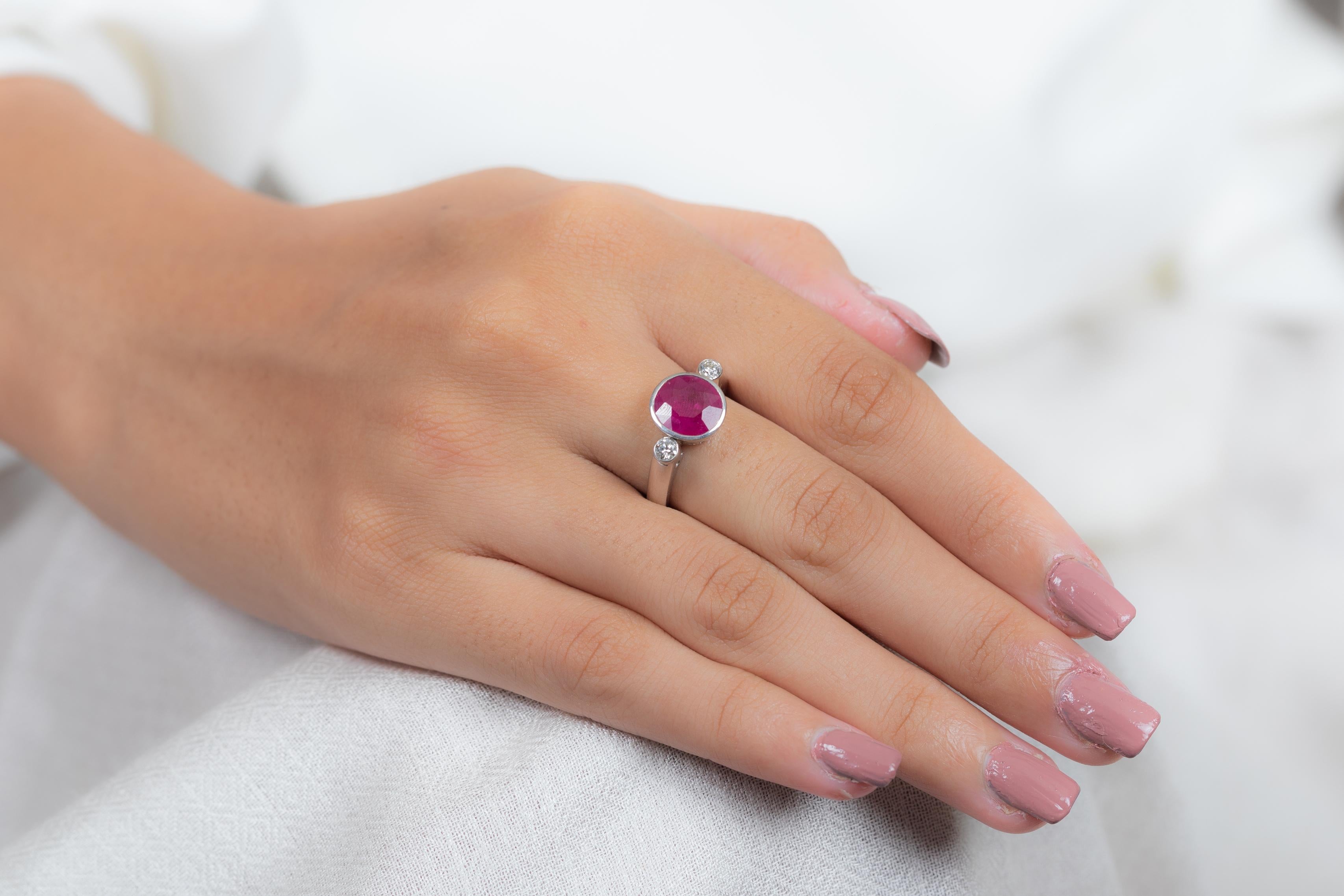 For Sale:  3 Carat Classical Round Cut Ruby and Diamond Three Stone Ring in 18K White Gold  7