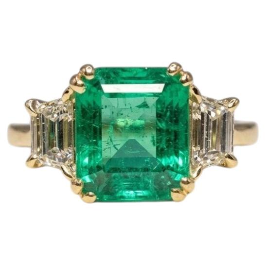 3 Carat Colombian Emerald Trapezoid Diamond Three-Stone Ring