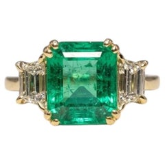3 Carat Colombian Emerald Trapezoid Diamond Three-Stone Ring