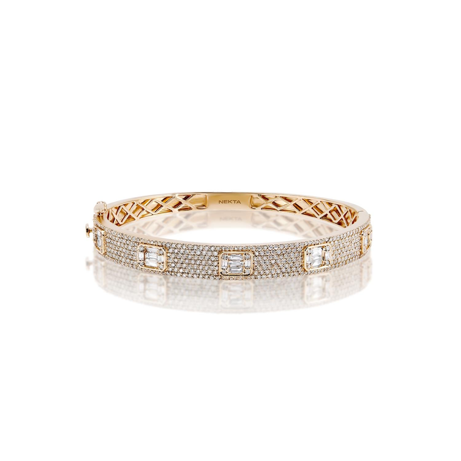 The RAMONA 3 Carat Diamond Bangle Bracelet features COMBINE MIX SHAPE DIAMONDS brilliants weighing a total of approximately 3.30 carats, set in 14K Rose Gold.

Style:
Diamonds
Diamond Size: 3.30 Carats
Diamond Shape: Combine Mix Shape
Metal: 14k