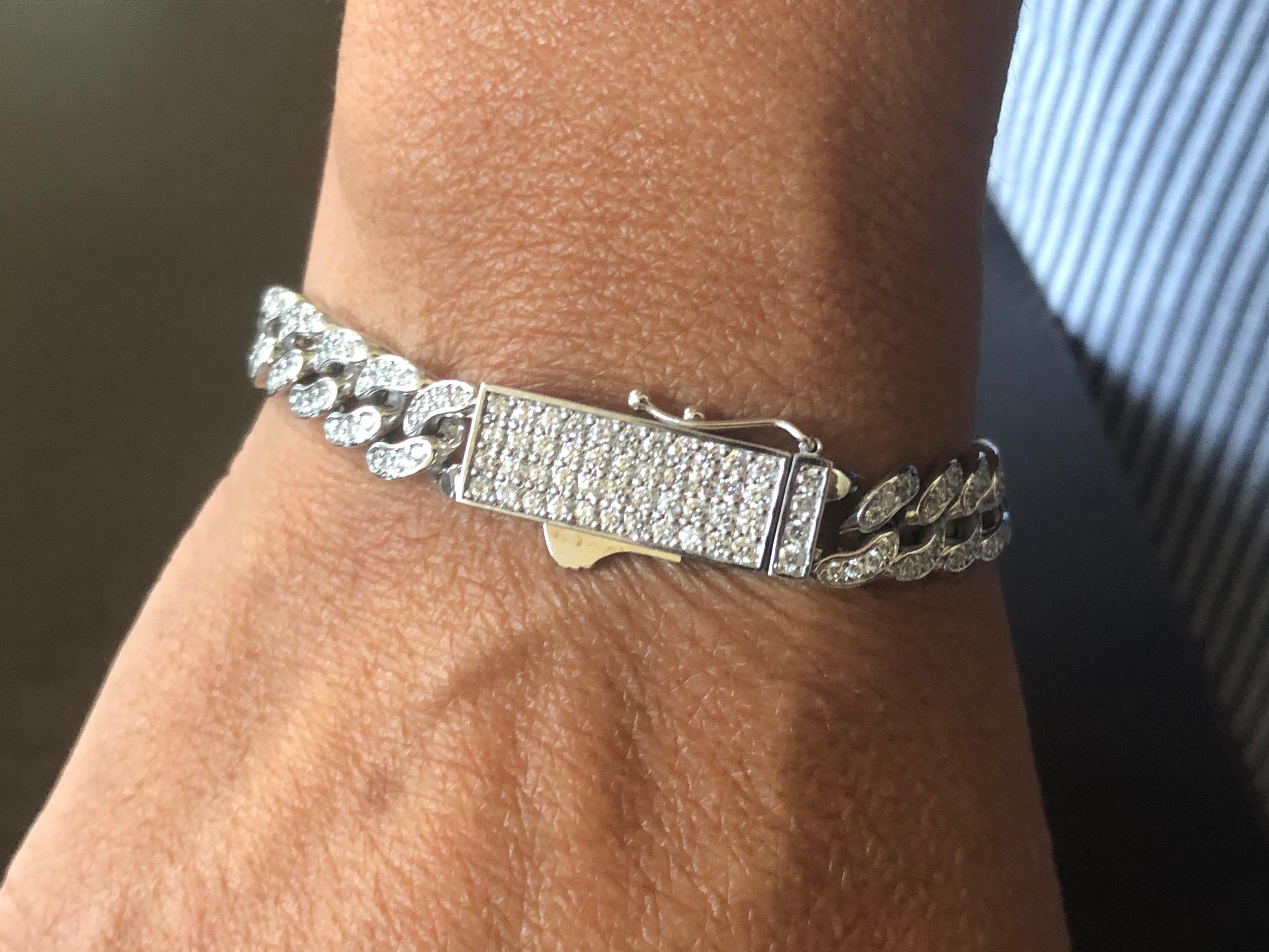 Cuban Diamond bracelet set in 14K white gold. The bracelet is manufactured in Italy. The total carat weight of the bracelet is 3.04 carats. The color of the stones are G-H, the clarity is SI1-SI2. The bracelet is available in yellow gold.