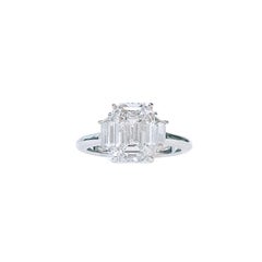 3 Carat, D Color Emerald-Cut Diamond Three-Stone Engagement Ring, GIA Certified.