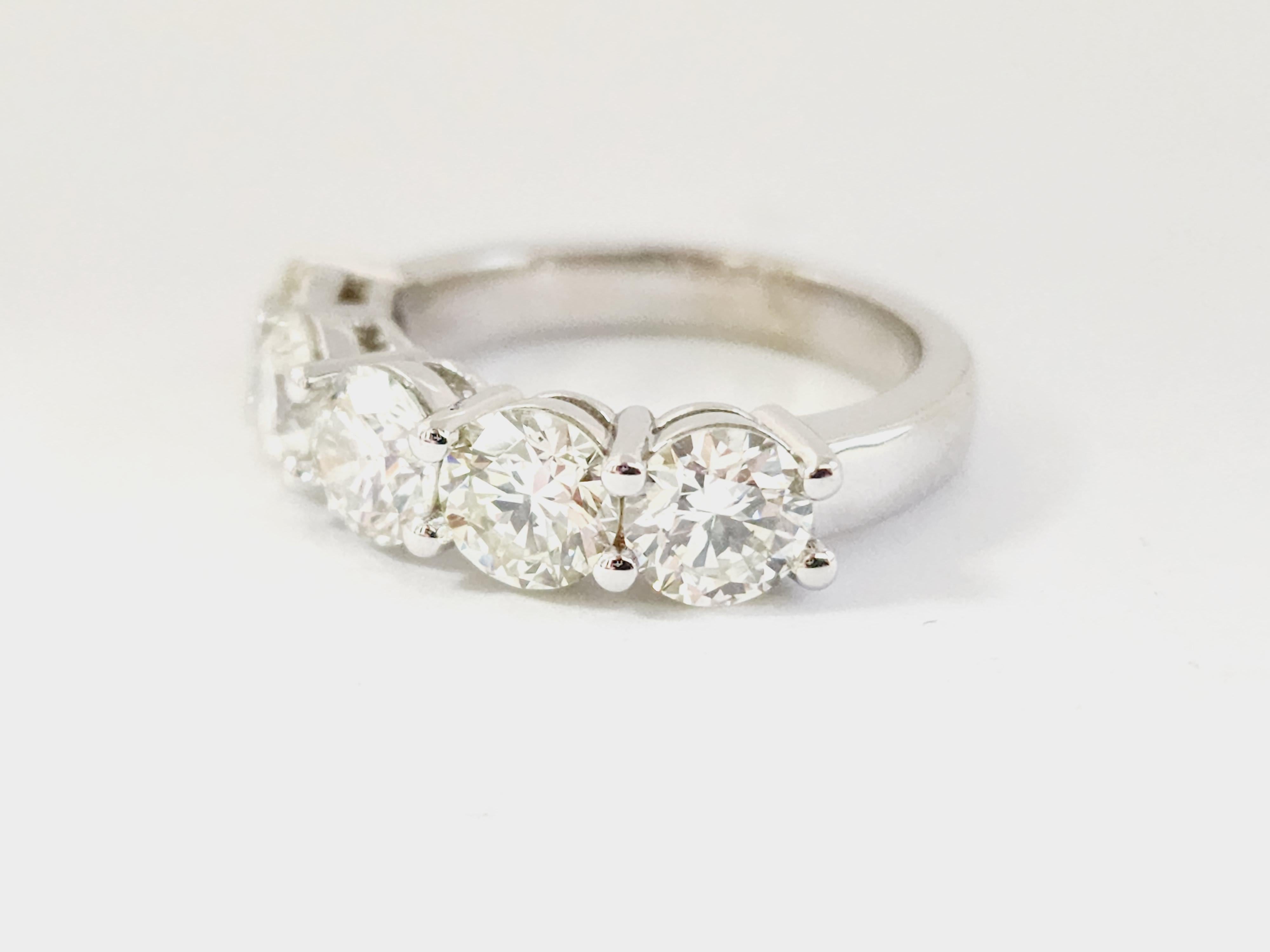 Beautiful 3 Carats Diamond Band White Gold 14 Karat, 
5 Pieces of Natural Diamonds, Average H-I Color Clarity VS,
Ring Size 6