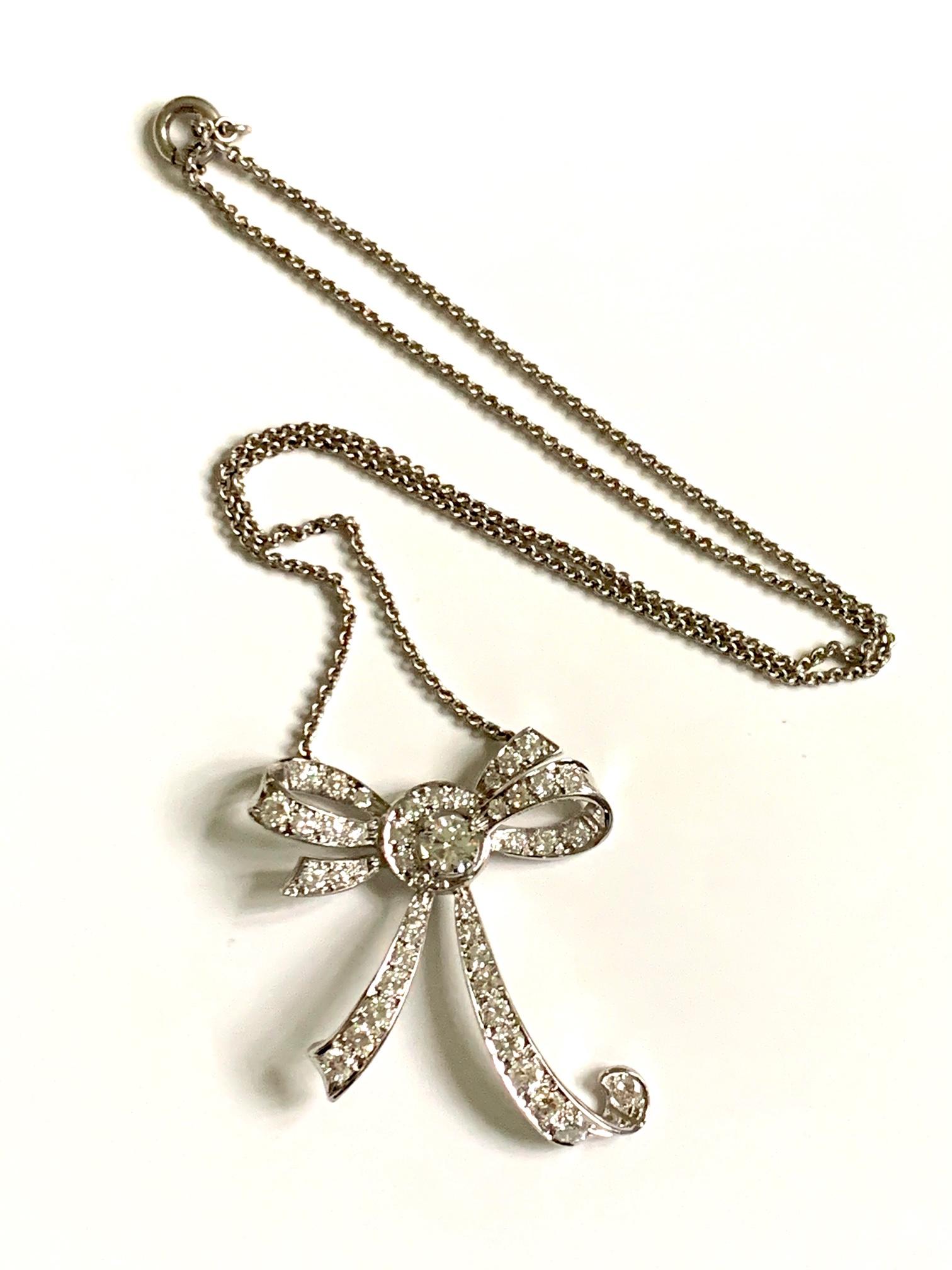 This is an amazing necklace for an amazing person!  This Platinum, 3 carat diamond necklace is designed as a big bow to complement any formal occasion. 

The diamonds are approximately 3ctw.
