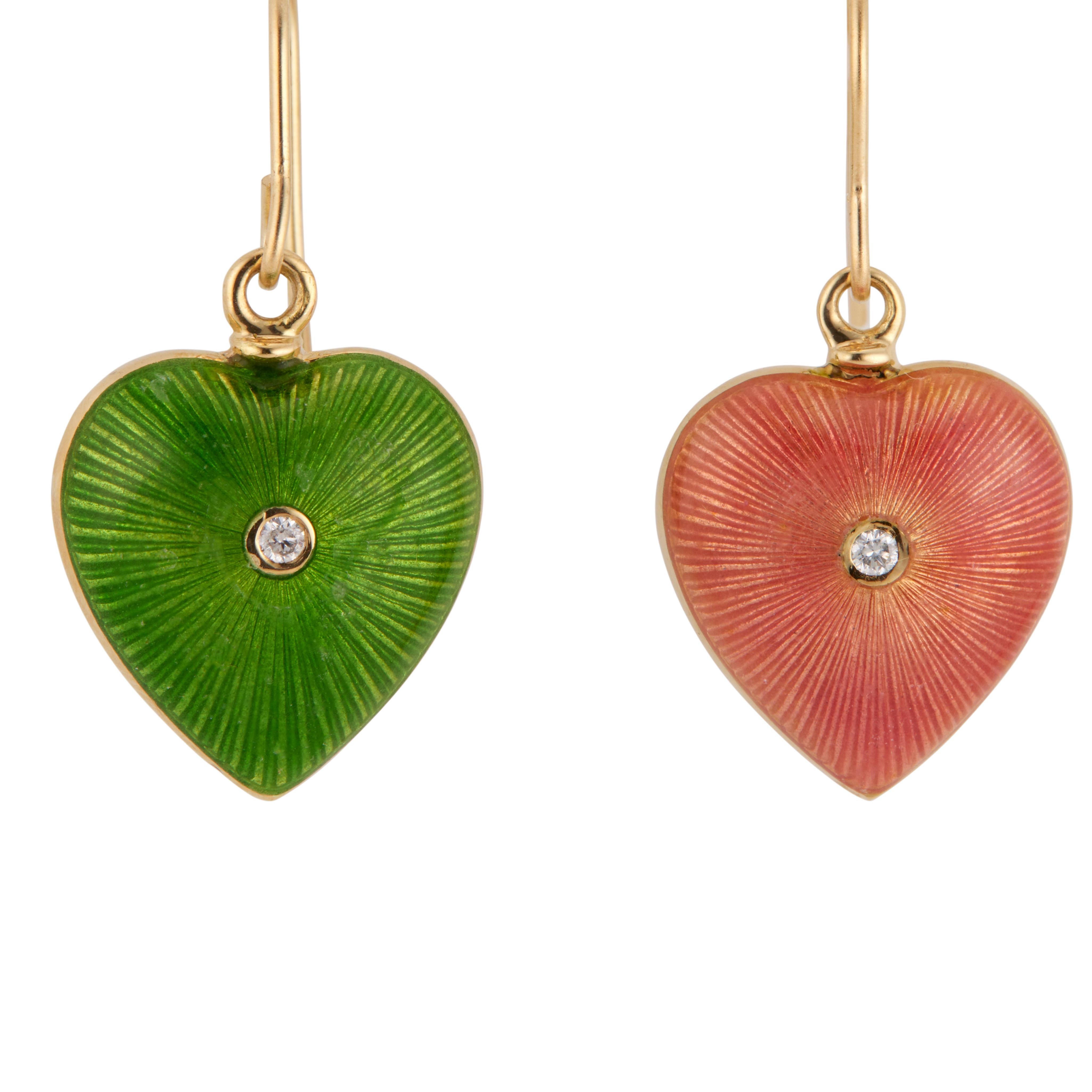 3-D puffed heart pink and green enamel diamond dangle earrings. 2 puffed enamel hearts each with a round cut diamond in the center and 18k yellow gold frames.  

2 round brilliant cut diamonds, H VS approx. .3cts
18k yellow gold 
Stamped: 18k
9.4