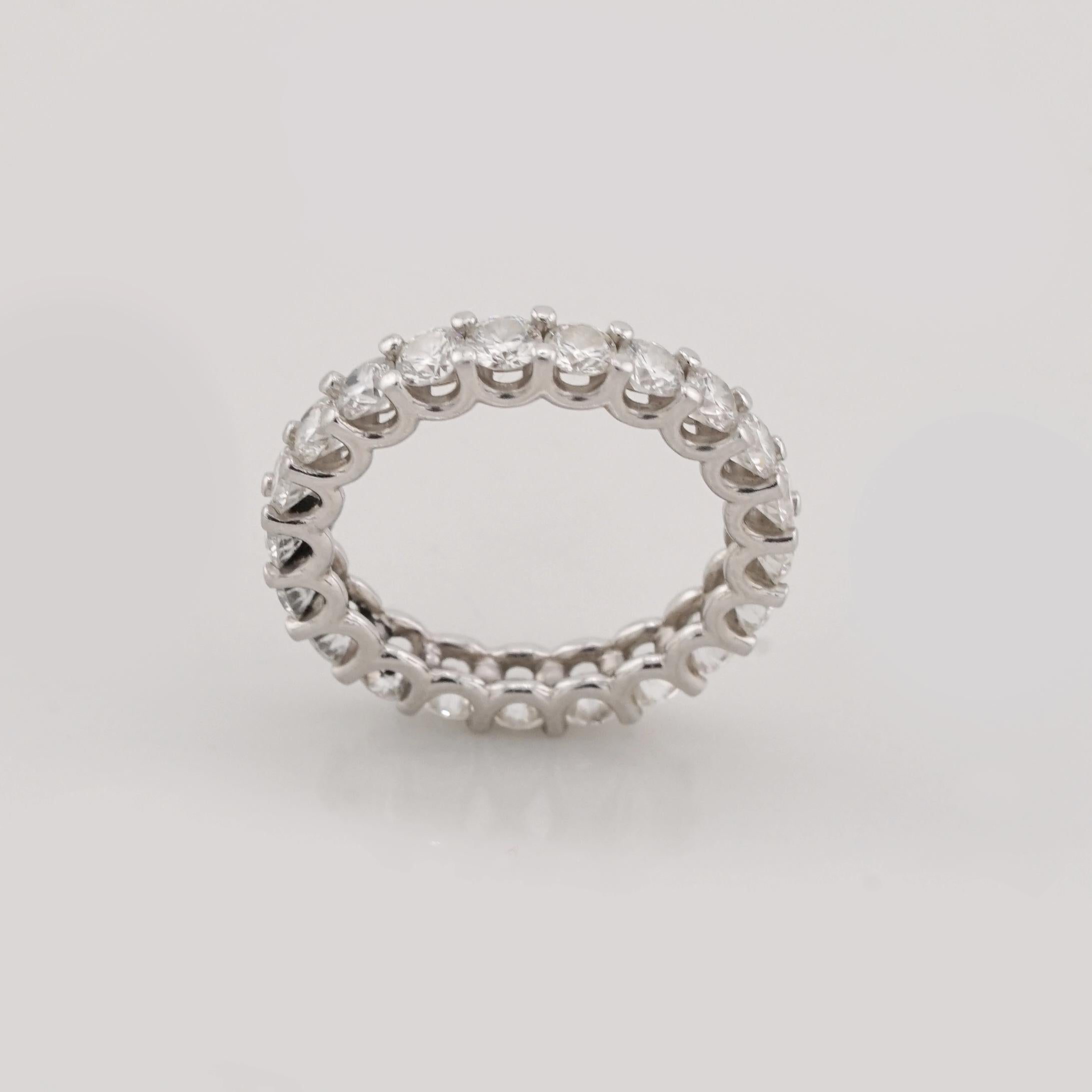 This breathtaking Tiffany & Co. eternity ring is a timeless symbol of elegance. 

Featuring 3 carat of round brilliant-cut diamonds of exceptional quality (D-E color, VVS1-Internally Flawless clarity), each stone is meticulously set in a platinum