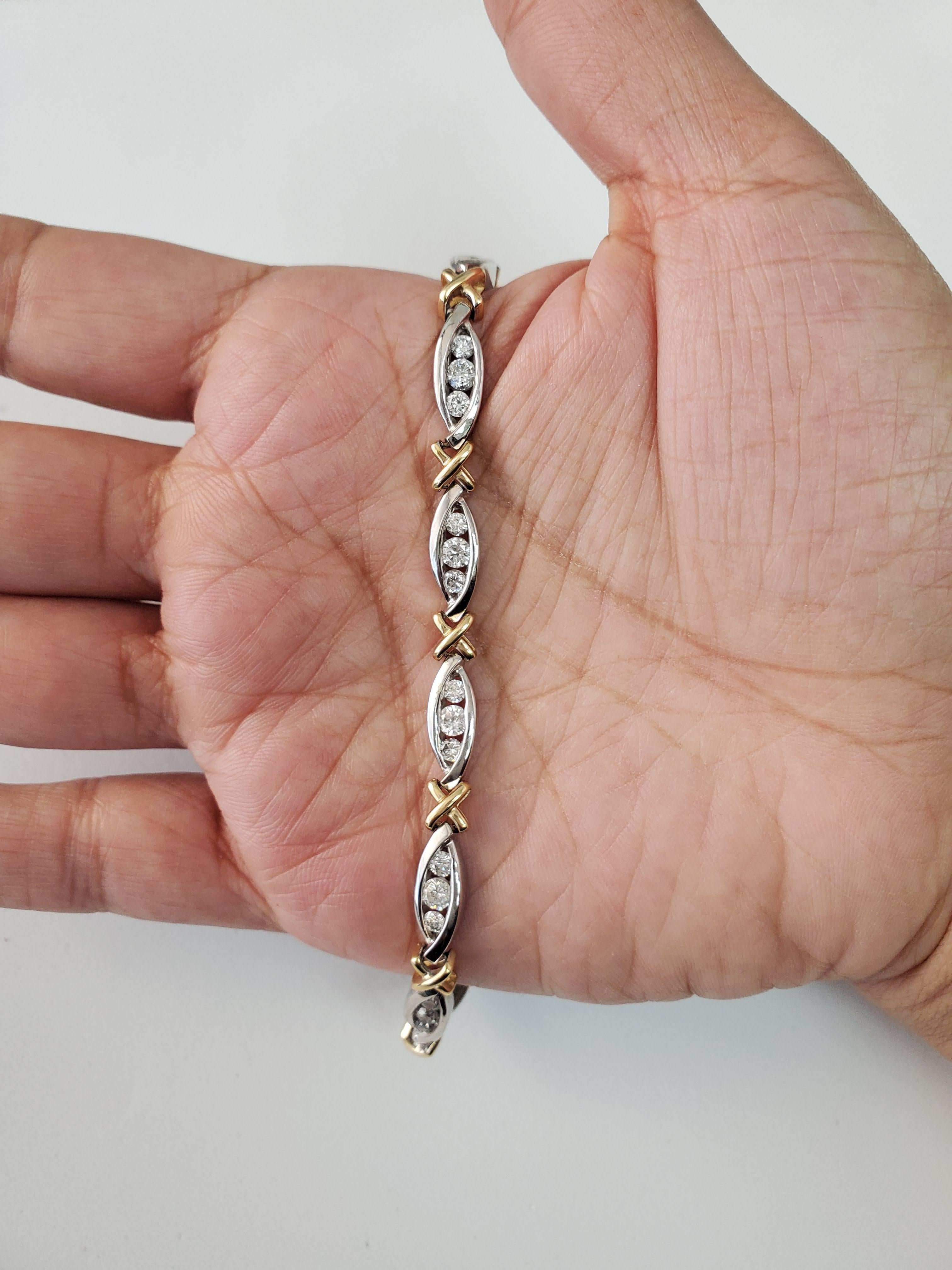 ♥ Tennis Bracelet Description ♥

Main Stone: Diamond
Approx. Total Carat Weight: 3.00cttw
Diamond Color: H/I
Diamond Clarity: VS2
Metal Type: 14K Two-Toned Gold
Stone Cut: Round
Metal Weight: 19 grams
Bracelet Length: 7.5 Inches
Bracelet Width: