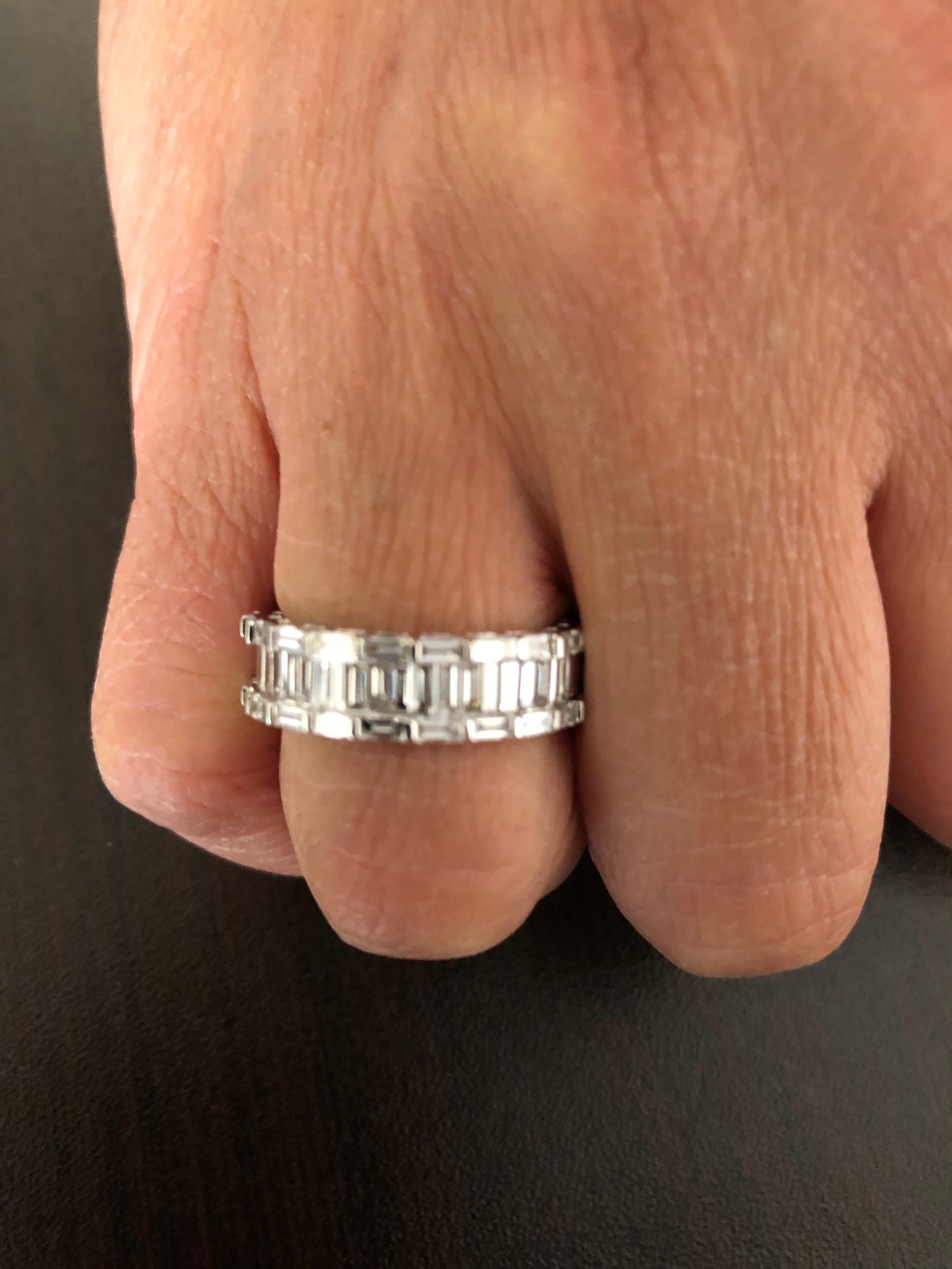 Baguette and Emerald Cut ring set in 18K white gold. The total carat weight of the ring is 2.95 carats. The stones are F color, the clarity is VS1. The ring is a size 6.5 and can be ordered to any finger size.