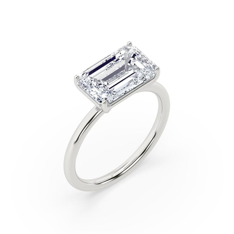 Contemporary 3 Carat Emerald Cut Diamond East to West Engagement Ring in Platinum For Sale