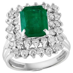 3 Carat Emerald Cut Emerald & 2 Carat Diamond Ring 14 Karat White Gold