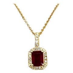 3 Carat Emerald Cut Ruby Pendant with Diamonds 14 Karat Yellow Gold Chain