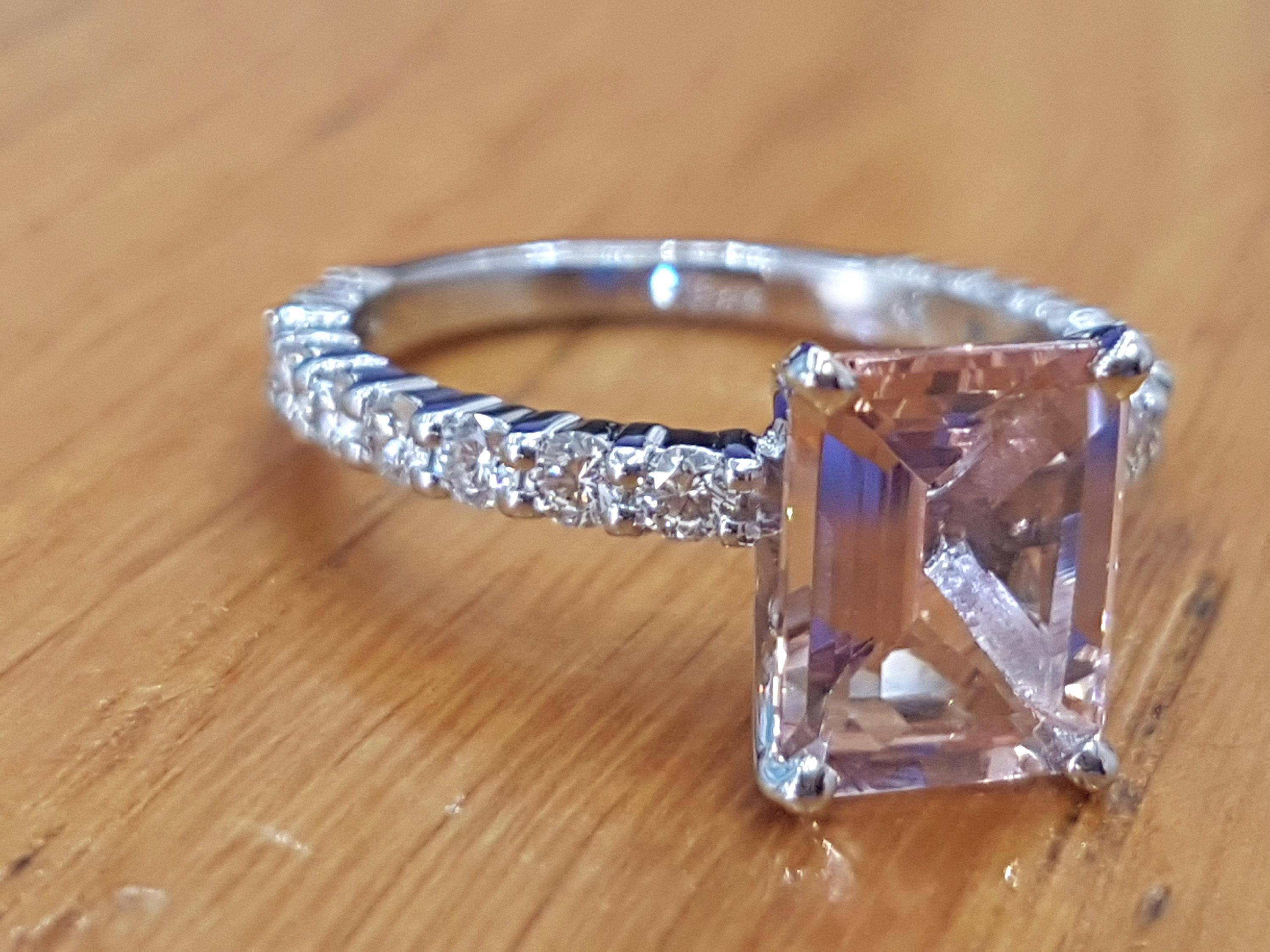 3k emerald cut diamond ring