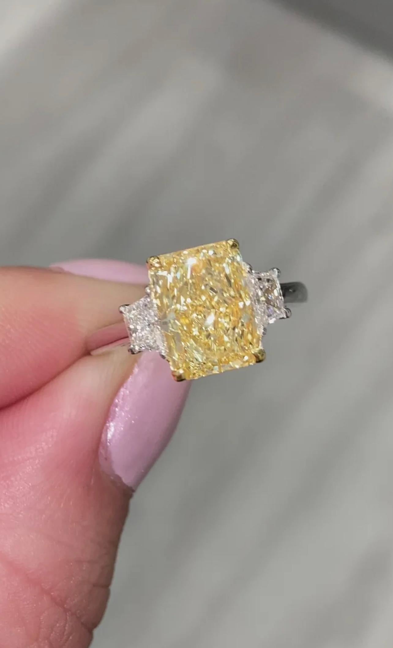 The perfect diamond. Period. 

Beautiful long model with a great spread
Vibrant Fancy Light Yellow
Color evenly distributed throughout the stone

Internally Flawless Clarity

Excellent Polish and Symmetry and no fluorescence 
A diamond that will