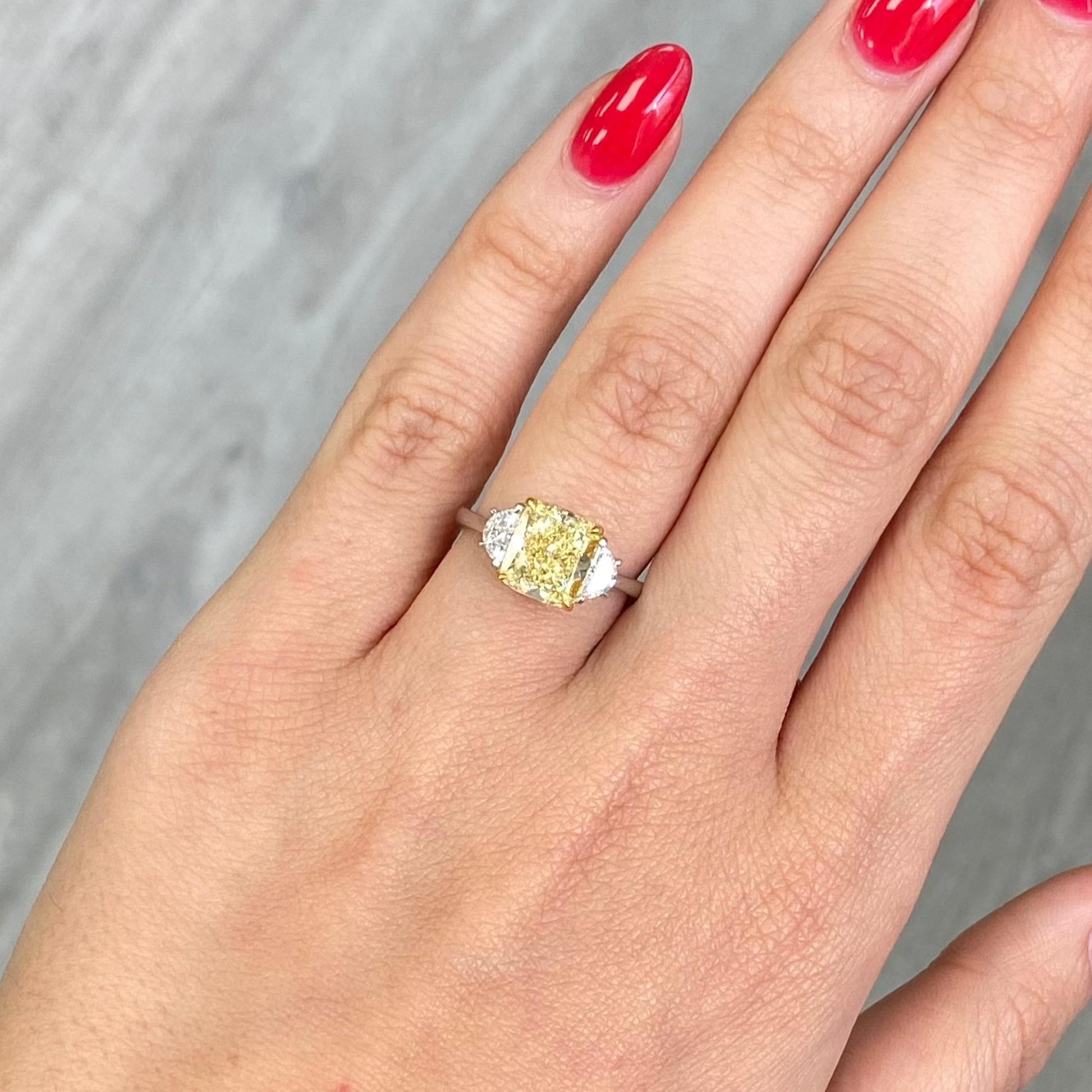 3 Carat Fancy Yellow Cushion Cut Diamond Three Stone Engagement Ring In New Condition For Sale In New York, NY