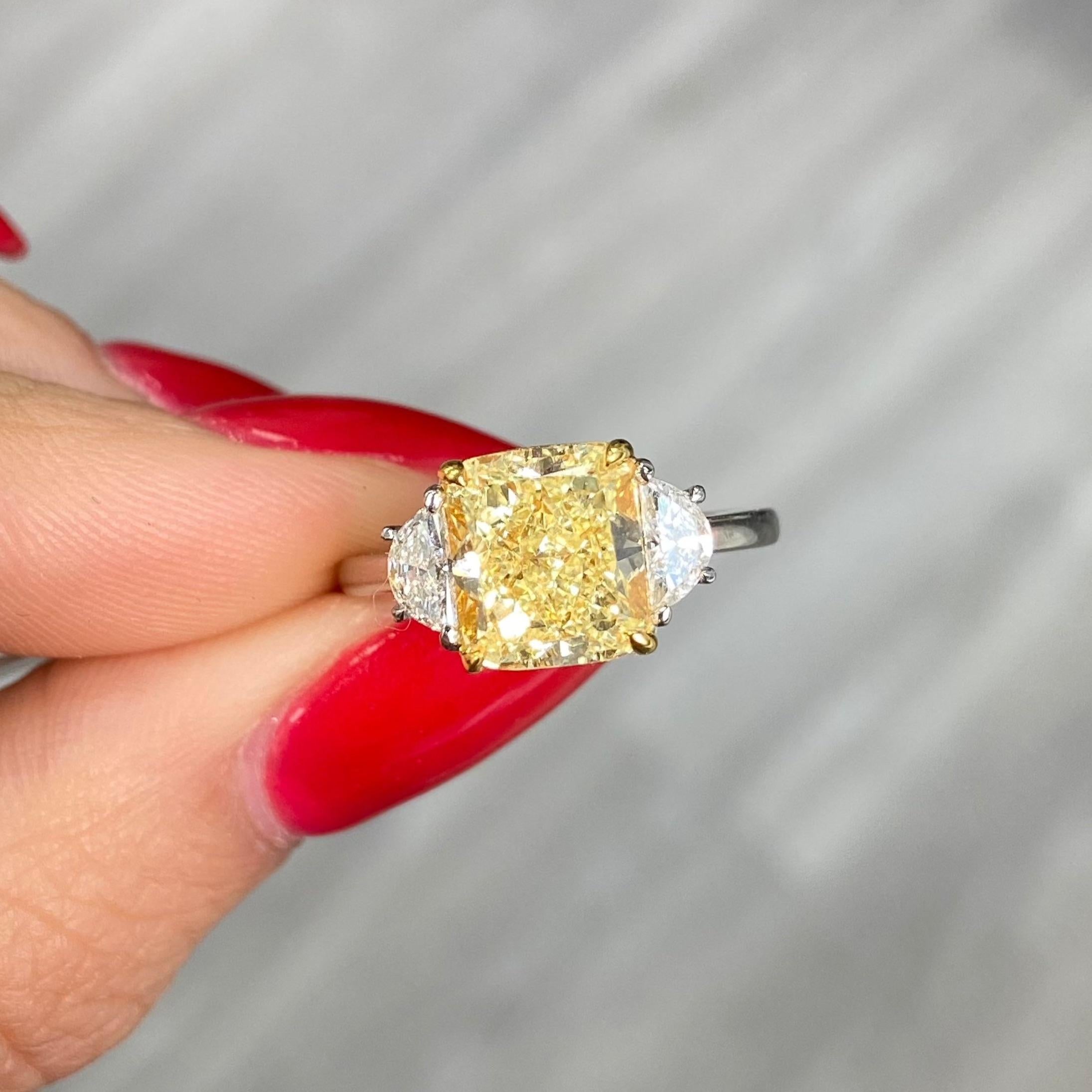 3 Carat Fancy Yellow Cushion Cut Diamond Three Stone Engagement Ring For Sale 1