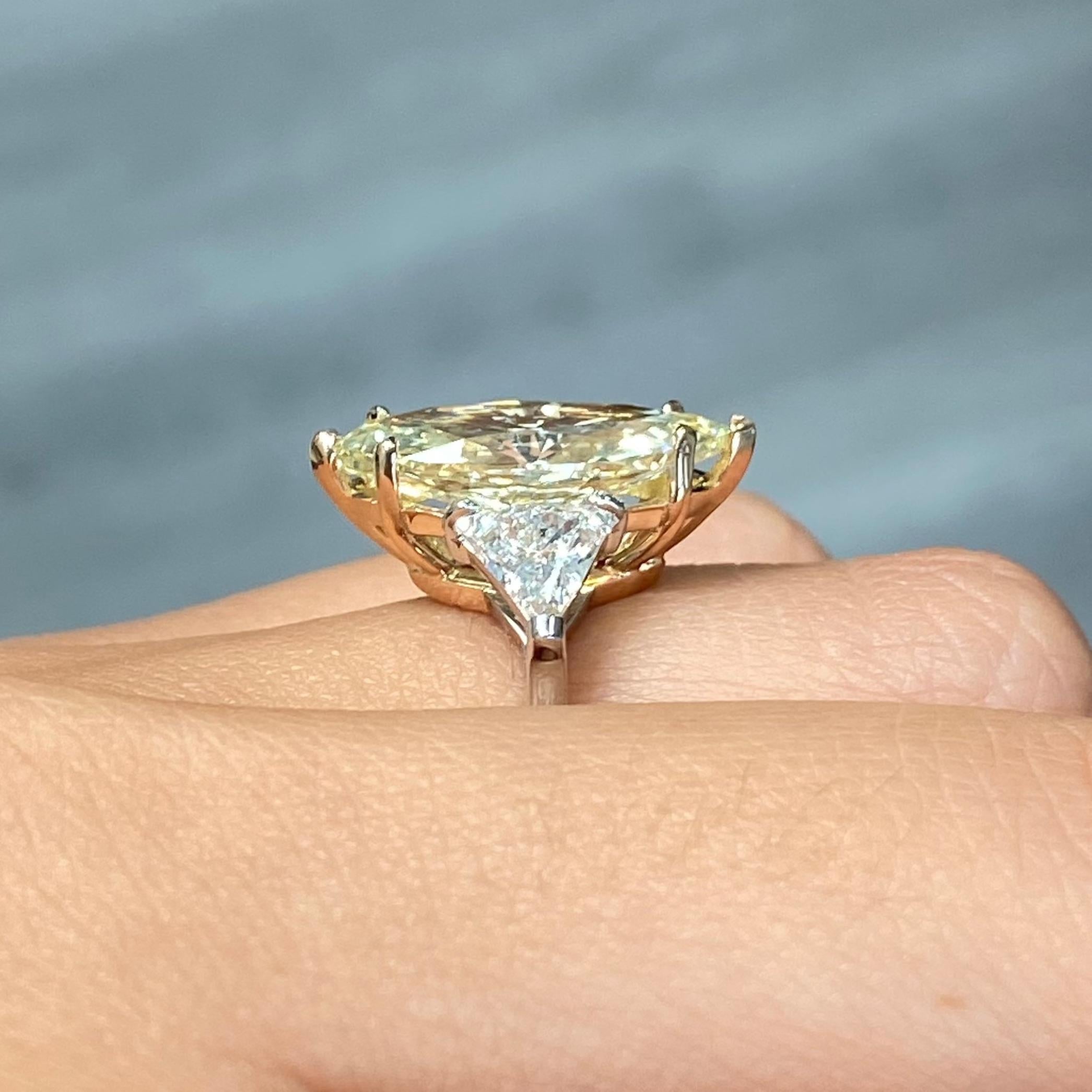 Women's 3 Carat Fancy Yellow Marquise Diamond Three Stone Ring For Sale