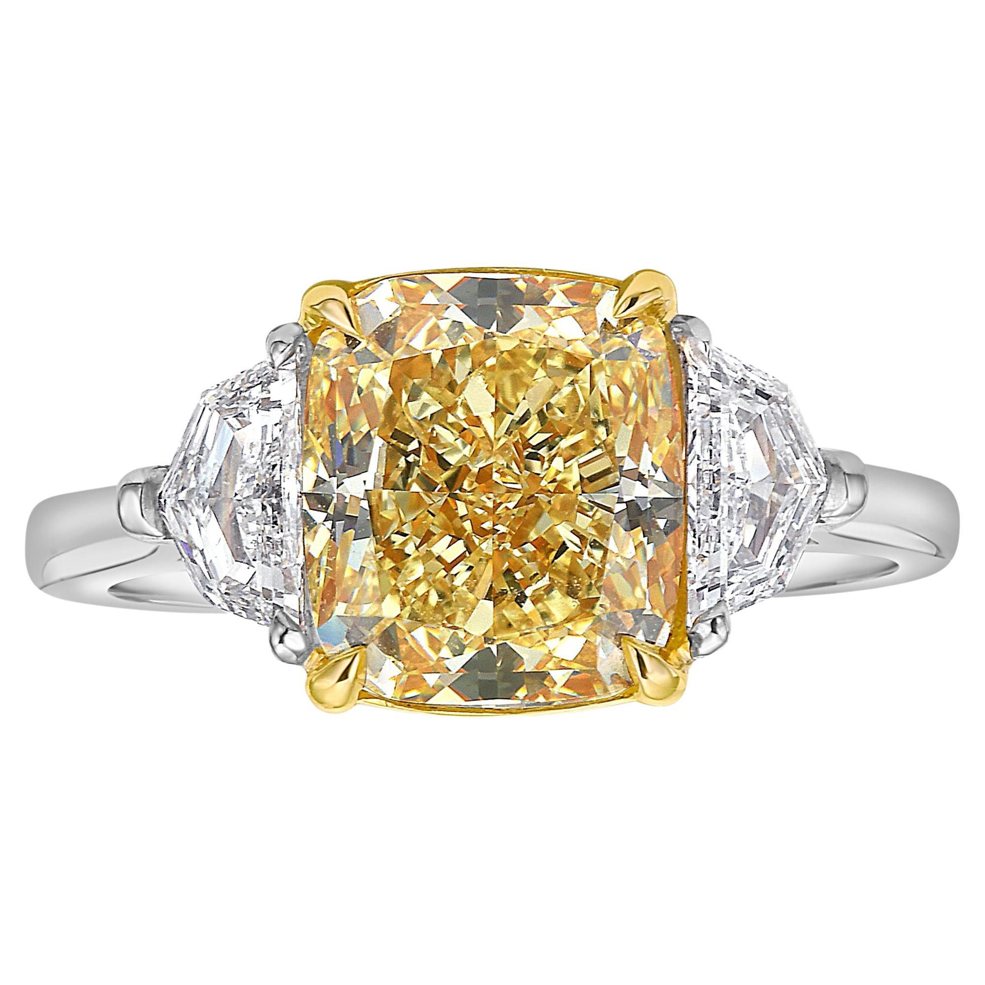 3 Carat Fancy Yellow VVS1 Cushion Cut Diamond Three Stone Ring For Sale