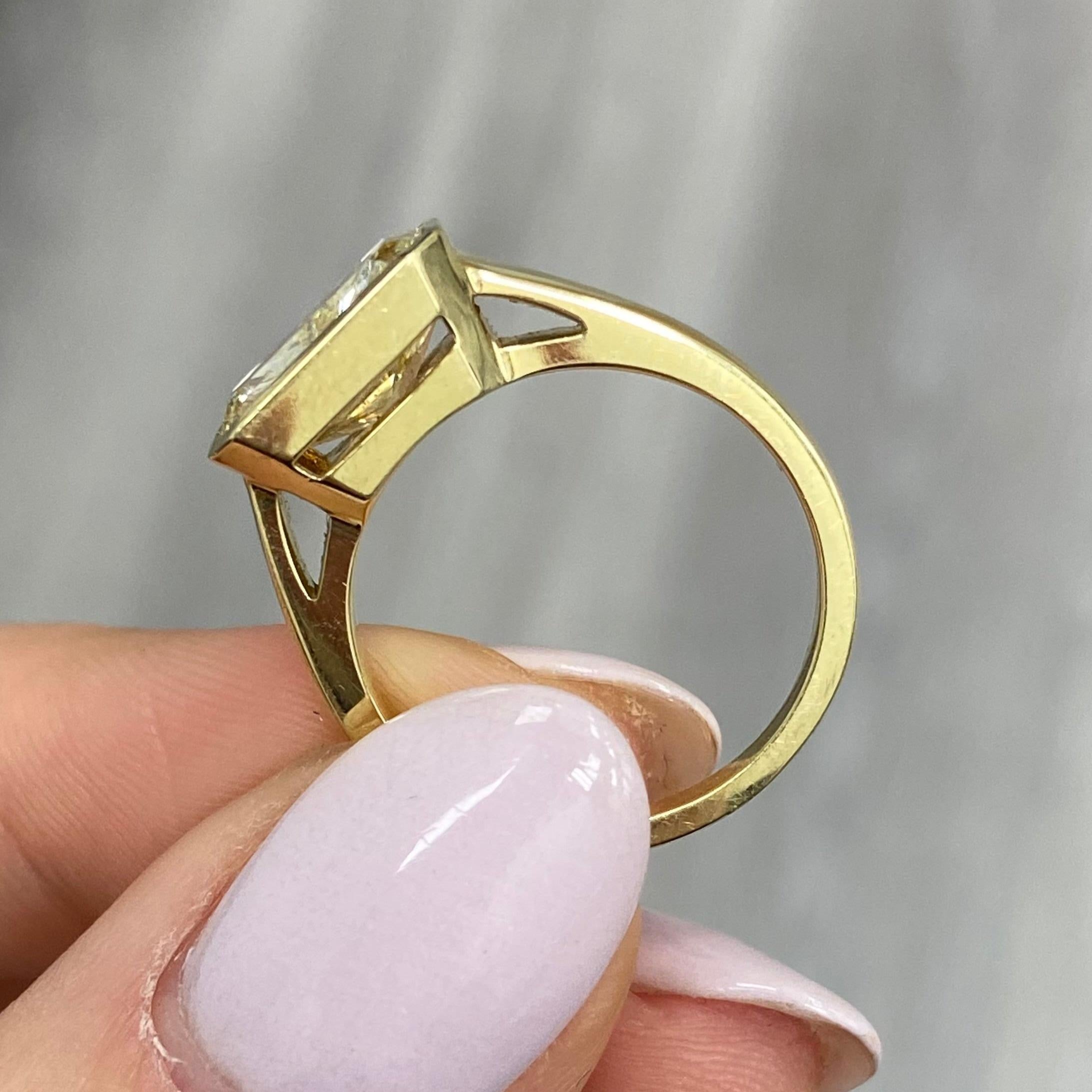 Radiant Cut 3 Carat GIA Fancy Light Yellow Bezel Set Diamond Ring For Sale