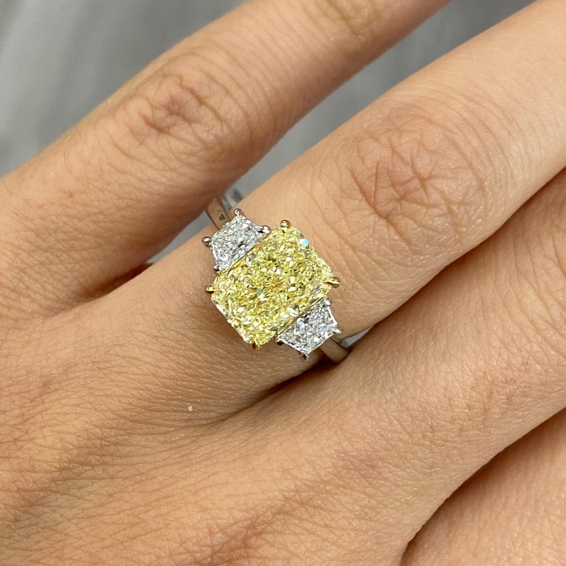 Radiant Cut 3 Carat GIA Fancy Light Yellow Elongated Radiant Diamond Three Stone Ring