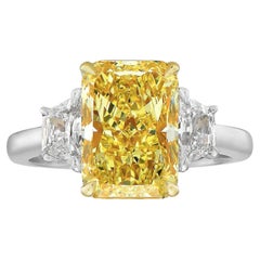3 Carat GIA Fancy Light Yellow Elongated Radiant Diamond Three Stone Ring